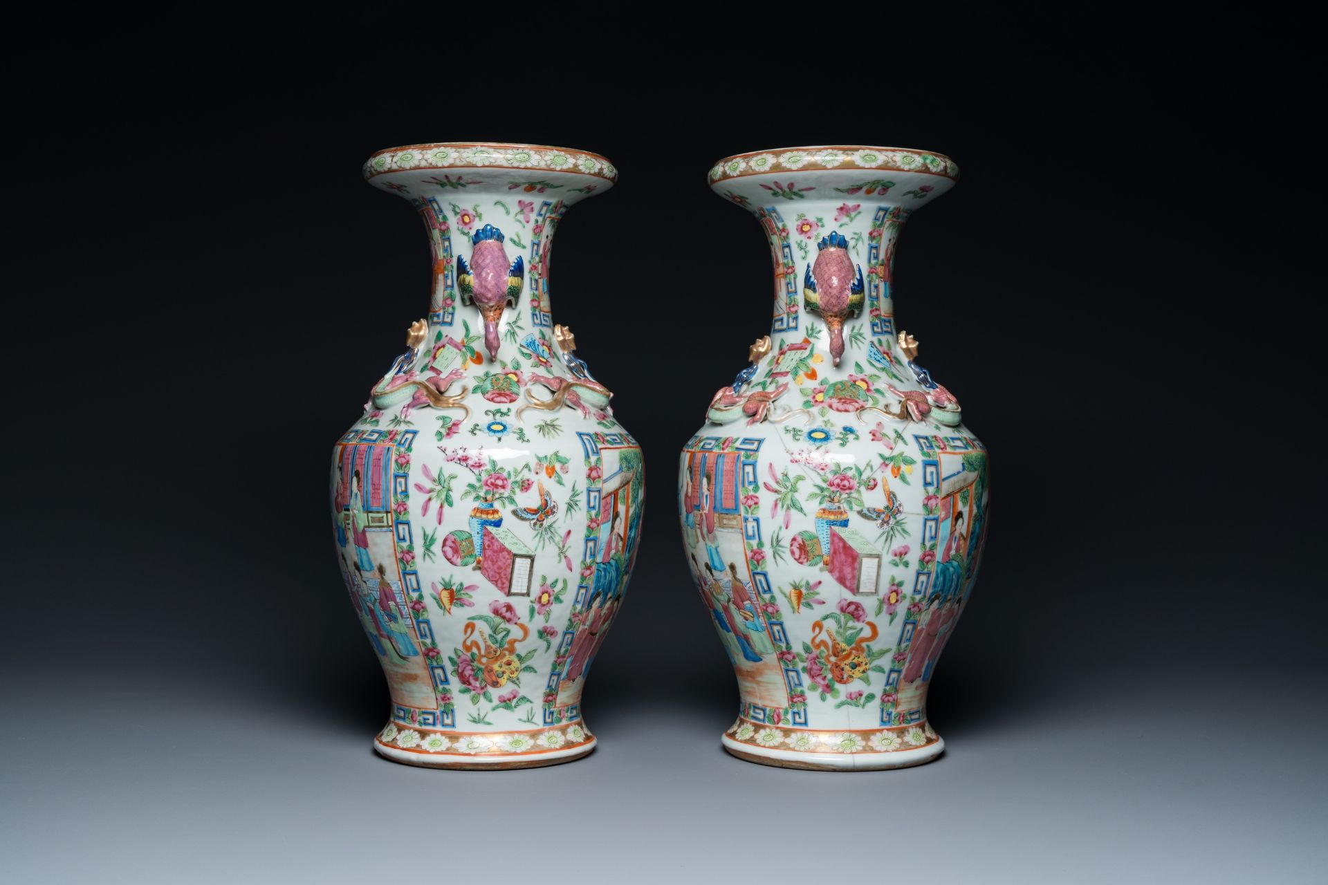 A pair of Chinese Canton famille rose vases with duck-shaped handles, 19th C. - Image 3 of 7