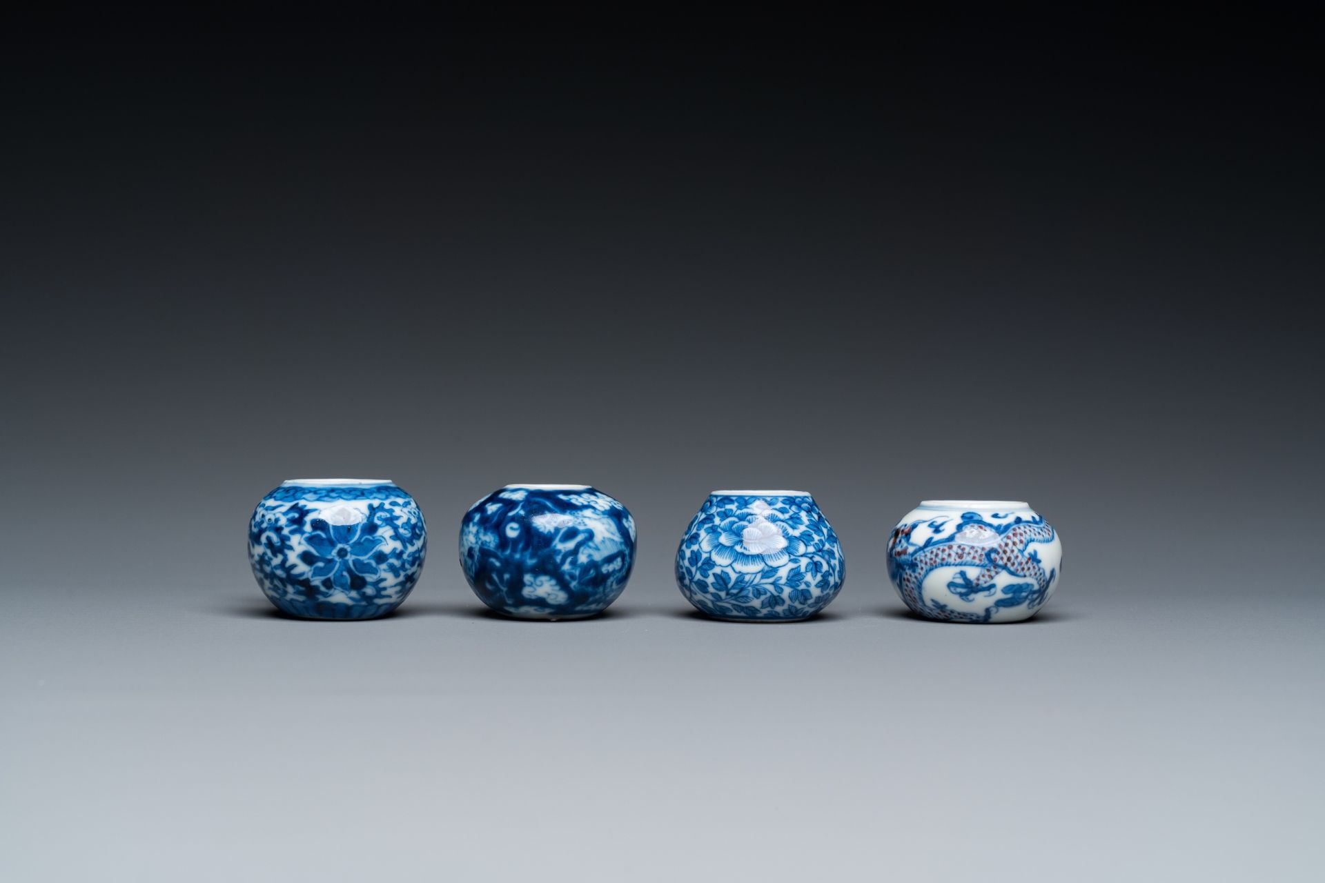 Four Chinese blue, white and copper-red bird feeders, 19th C. - Image 3 of 7
