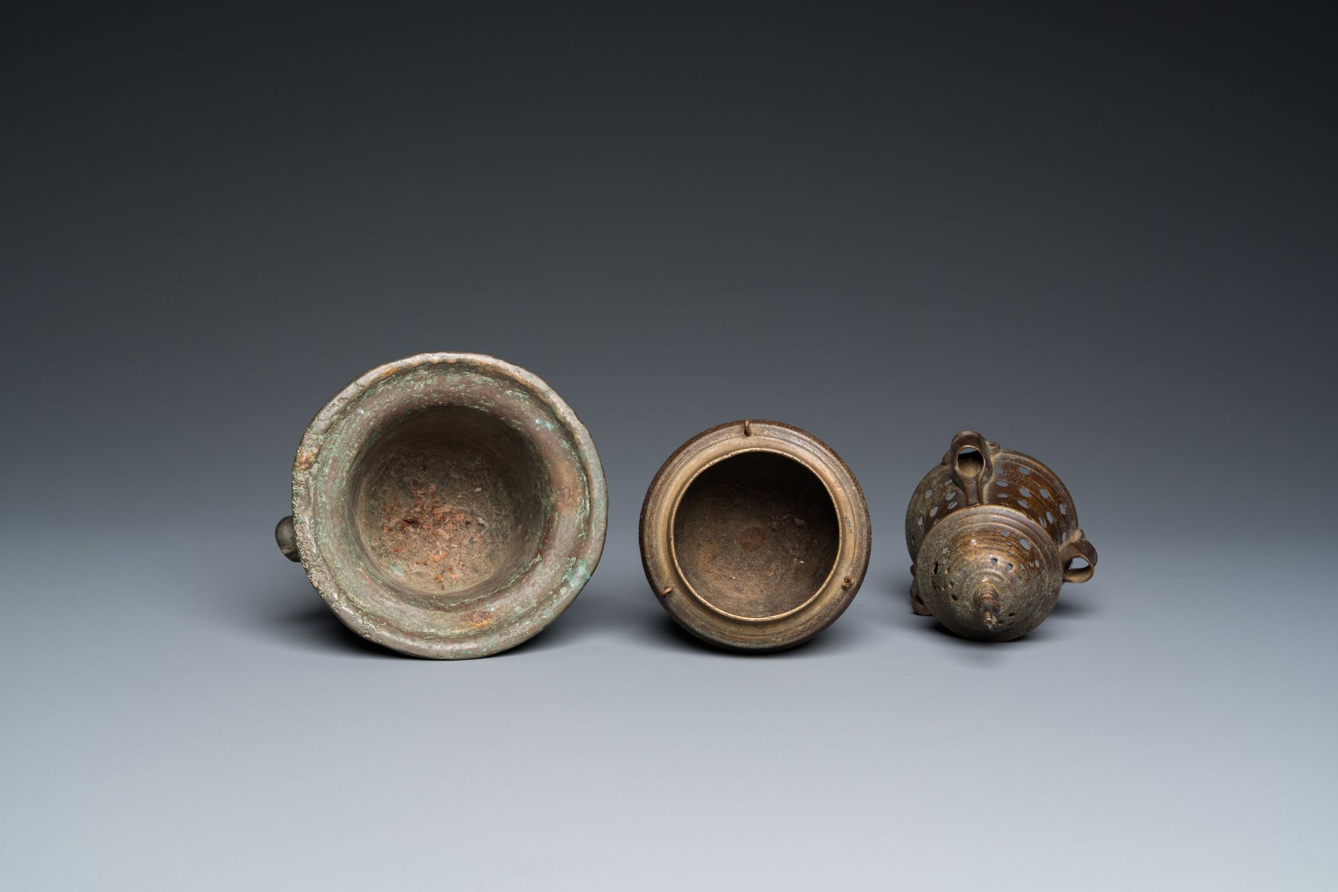 A bronze mortar, a censer and two pax of which one gilded, Western Europe, 16/17th C. - Image 6 of 9