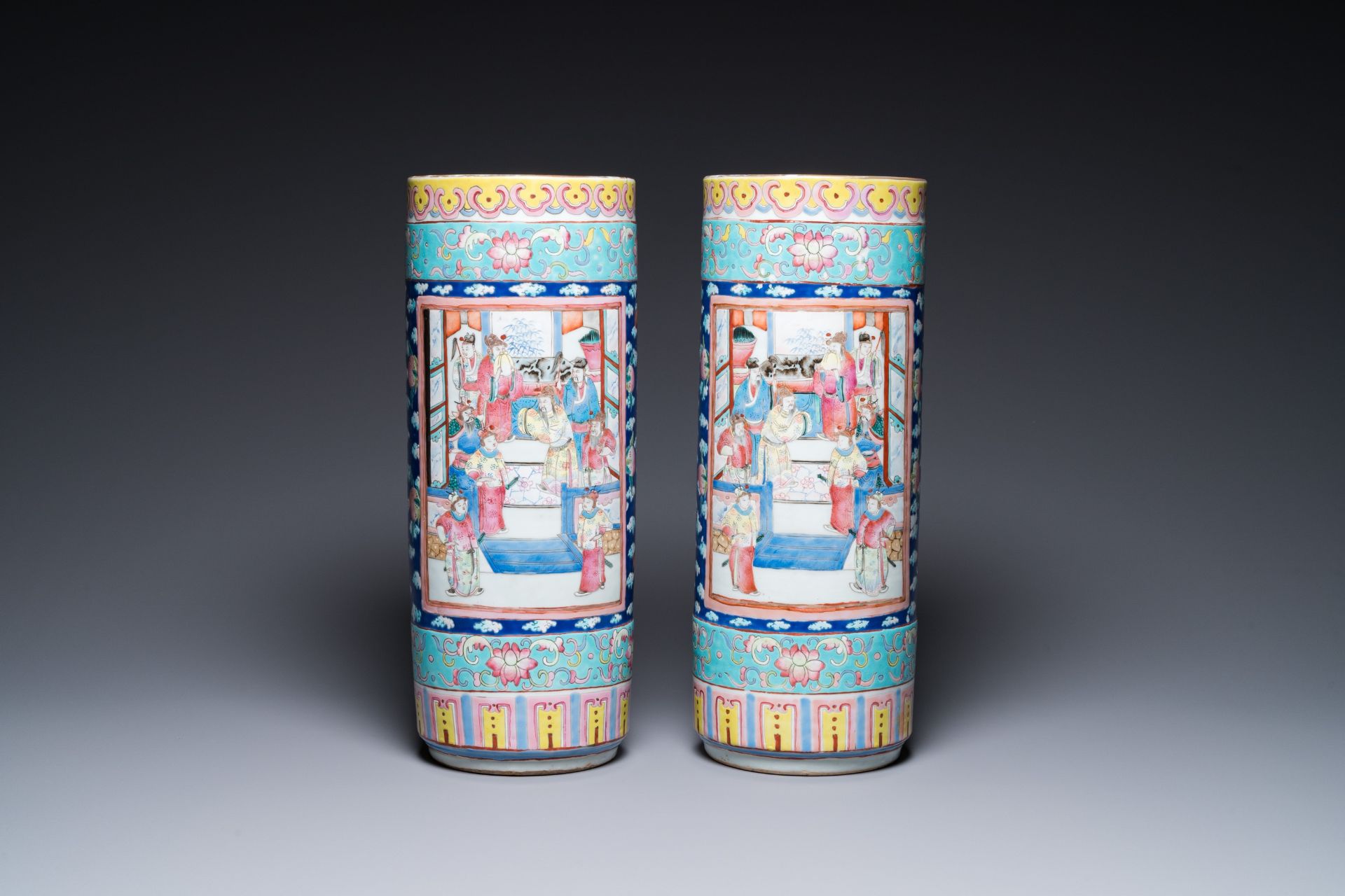 A pair of Chinese famille rose cylindrical vases, 19th C. - Image 3 of 6