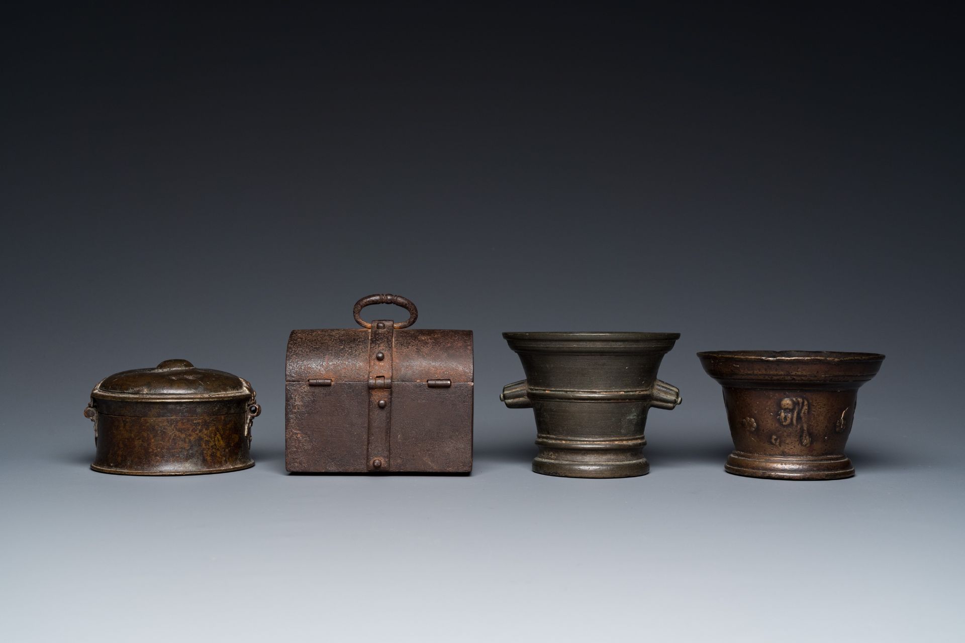 Two bronze mortars, a round lidded box and an iron casket, Western Europe, 16/17th C. - Image 3 of 9
