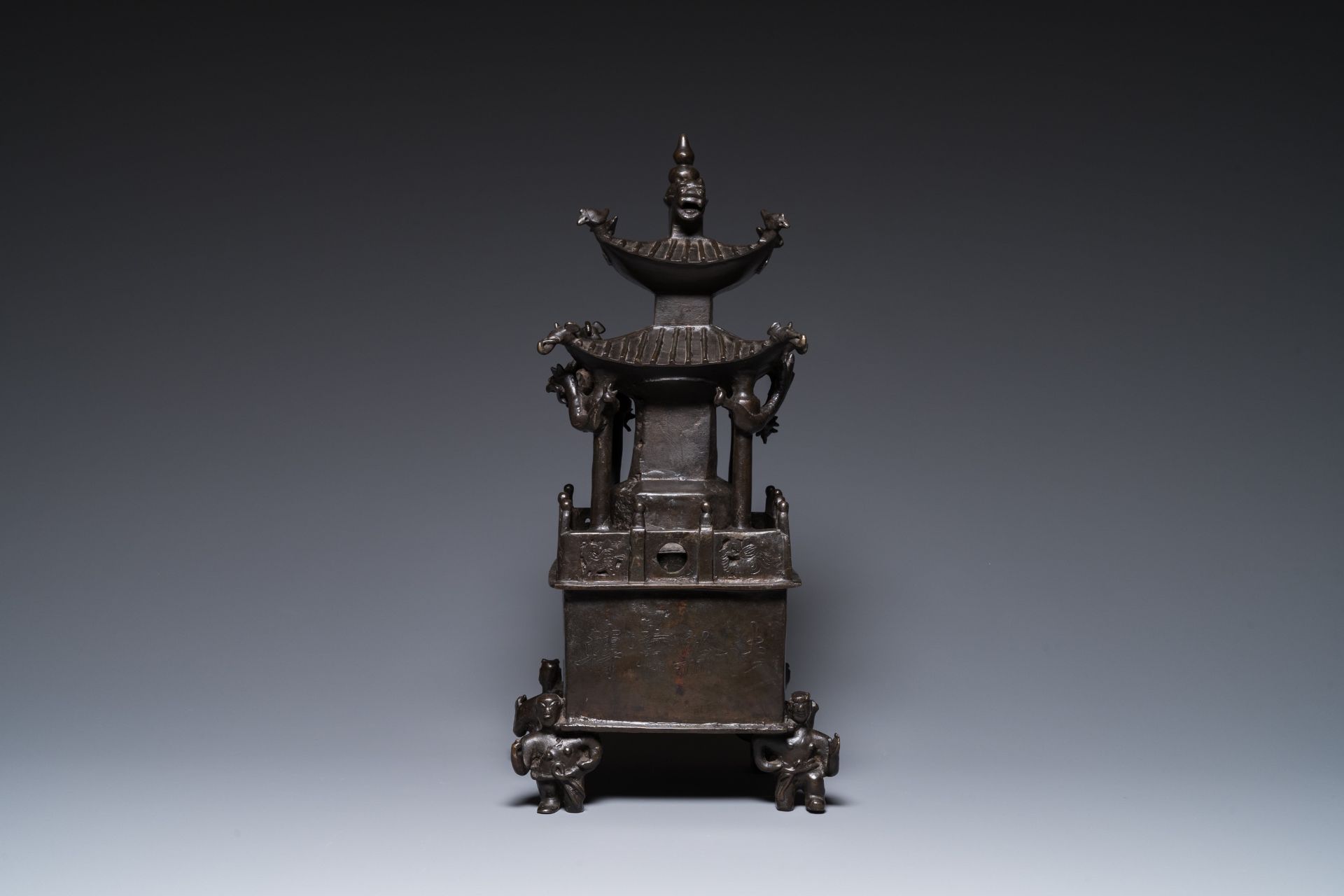 A Chinese inscribed bronze 'square pagoda' censer and cover, 17/18th C. - Image 5 of 7