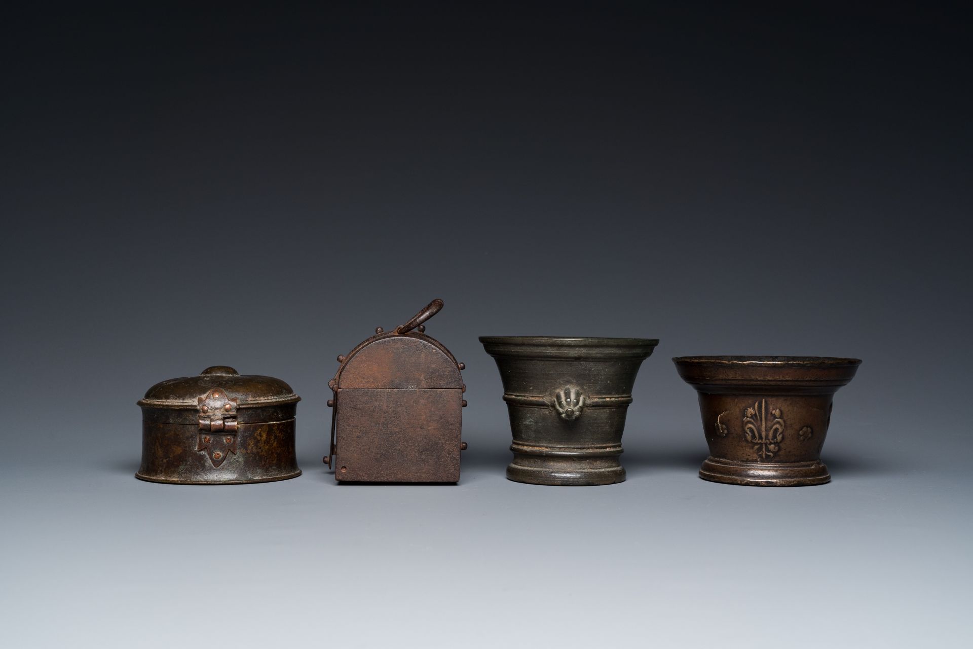 Two bronze mortars, a round lidded box and an iron casket, Western Europe, 16/17th C. - Image 6 of 9
