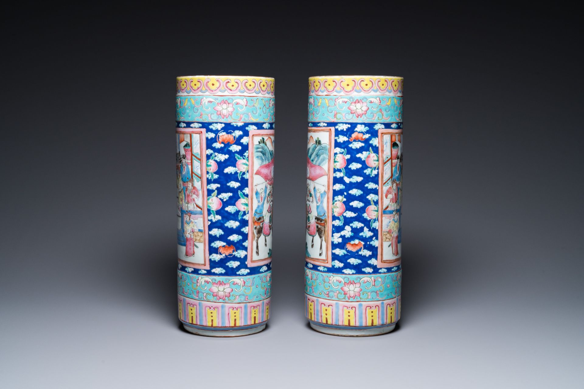 A pair of Chinese famille rose cylindrical vases, 19th C. - Image 4 of 6