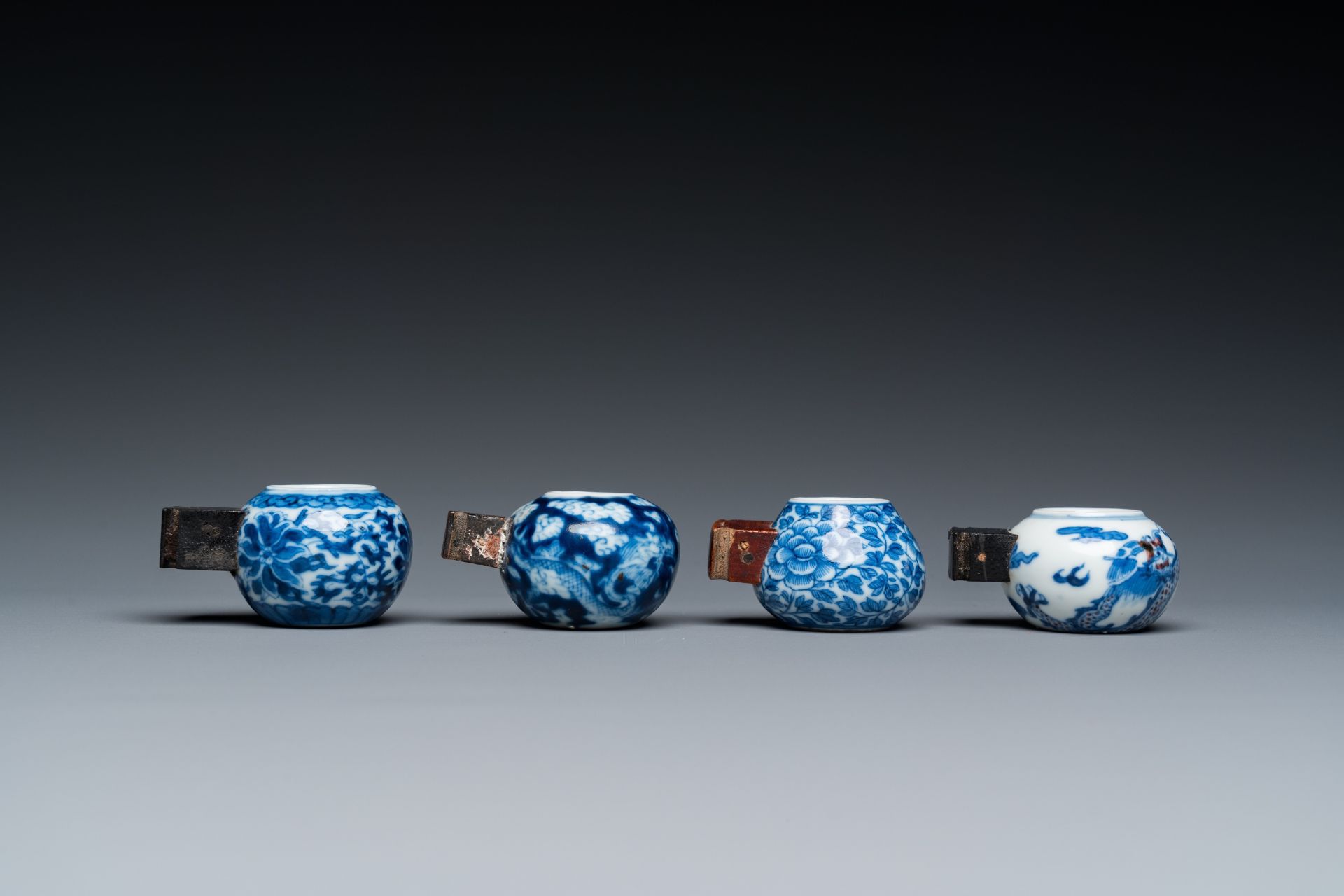 Four Chinese blue, white and copper-red bird feeders, 19th C. - Image 2 of 7