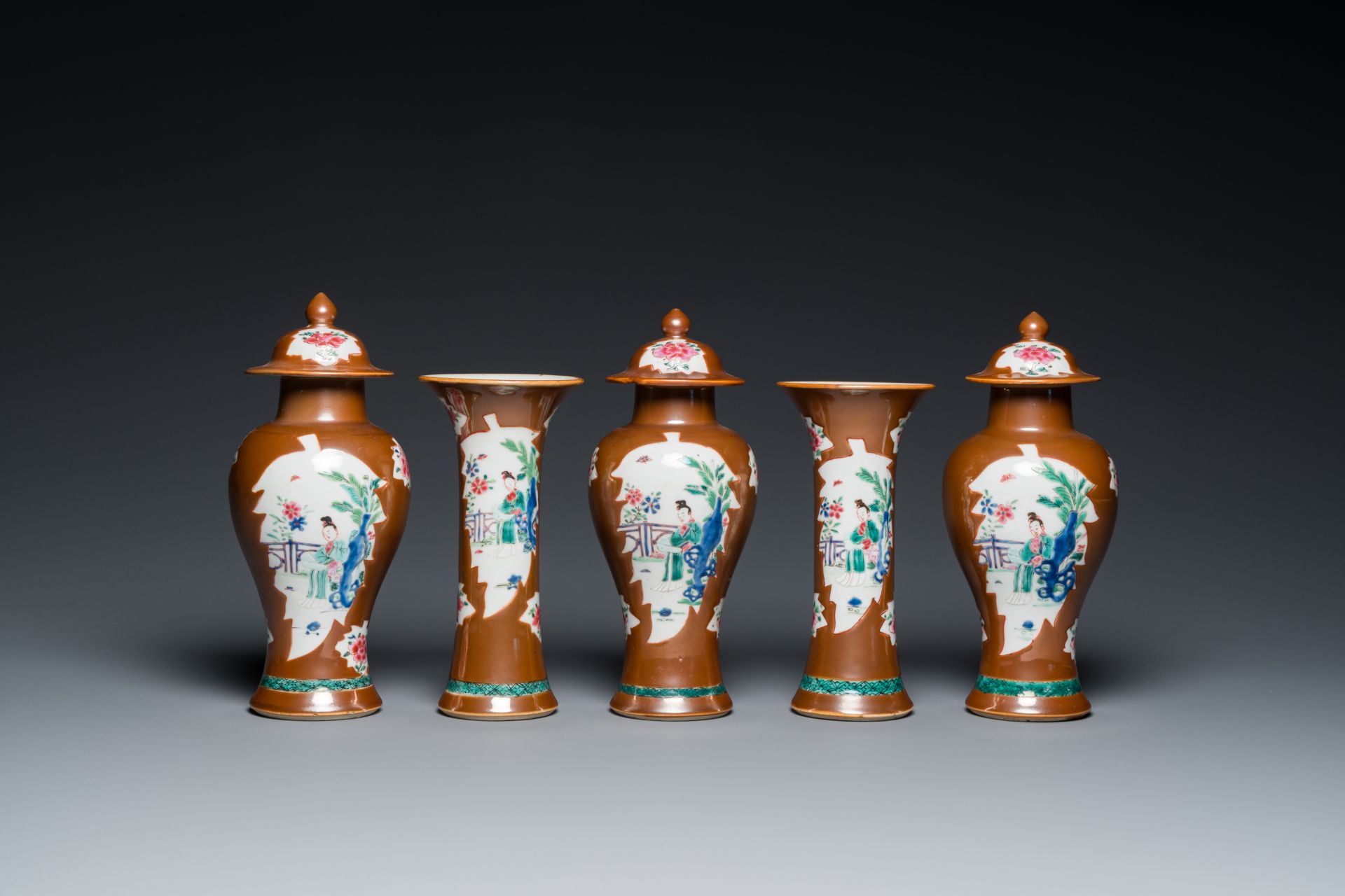 A Chinese capucin-brown-ground famille rose garniture of five vases with 'Xi Xiang Ji' design, Yongz