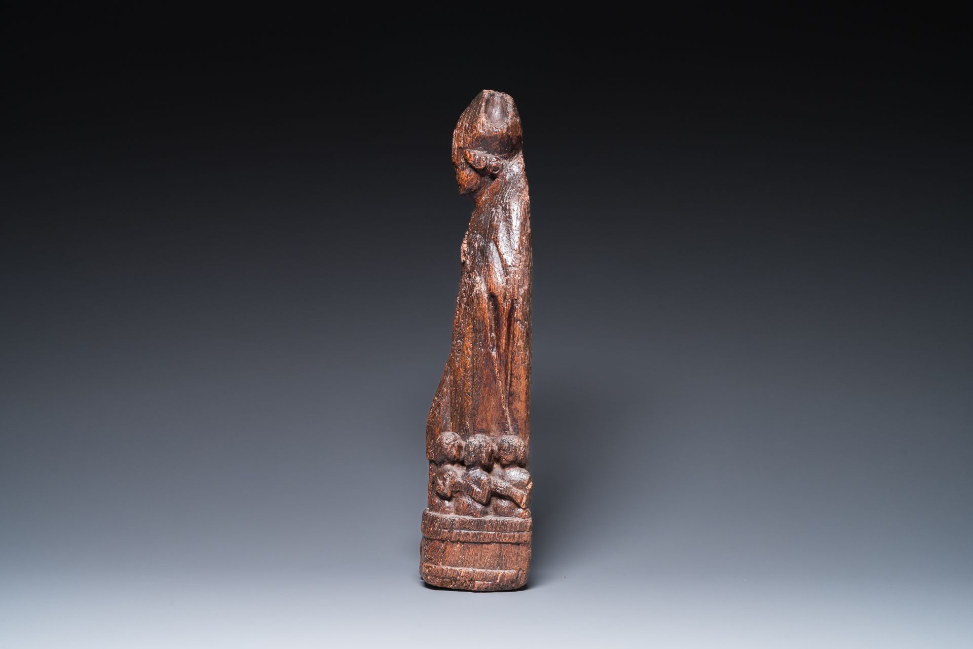 A Flemish carved oak sculpture of Saint Nicolas and the three boys in the salting-tub, 16th C. - Image 5 of 7