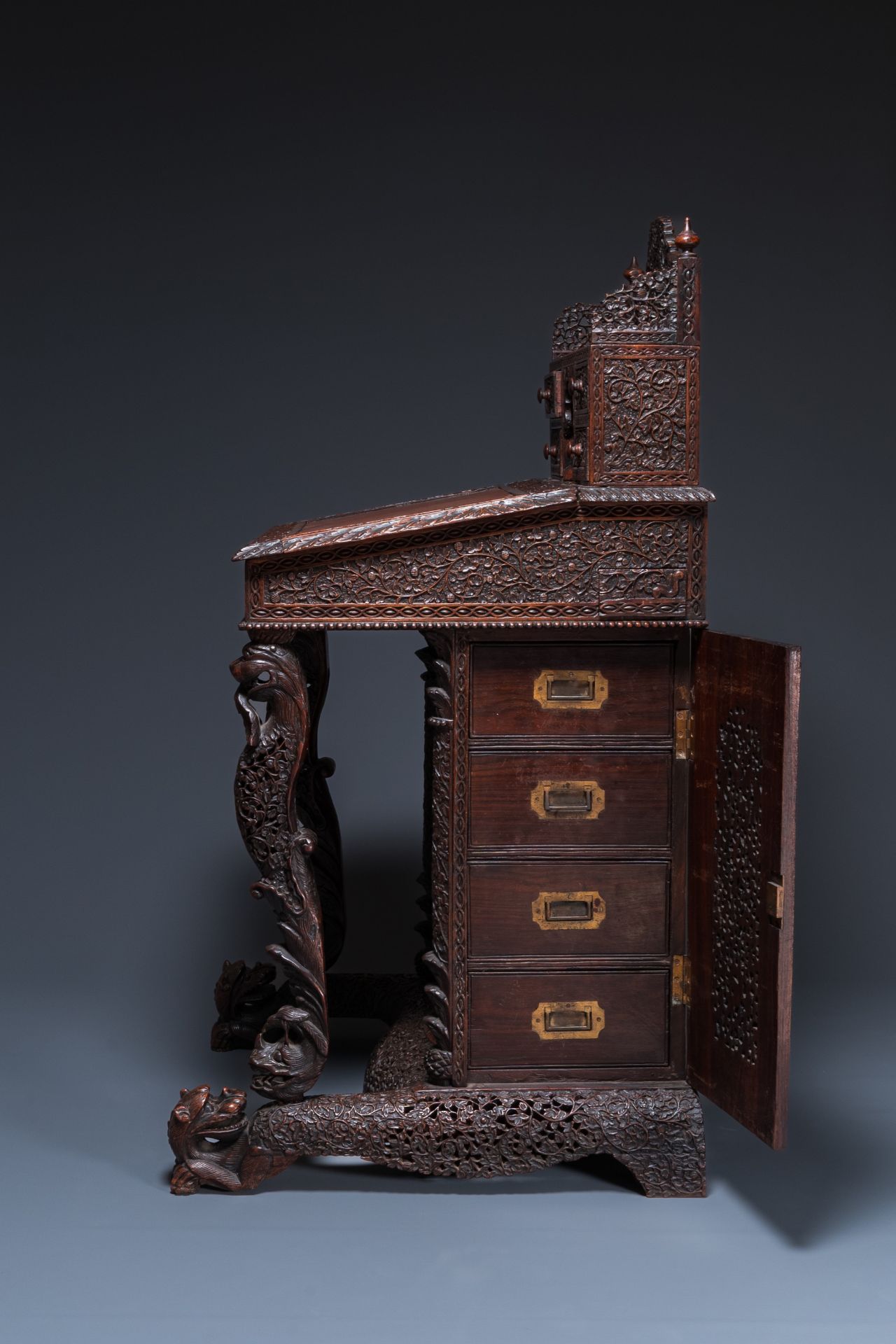 A colonial Anglo-Indian reticulated wooden desk with hidden compartment, 19th C. - Image 4 of 24