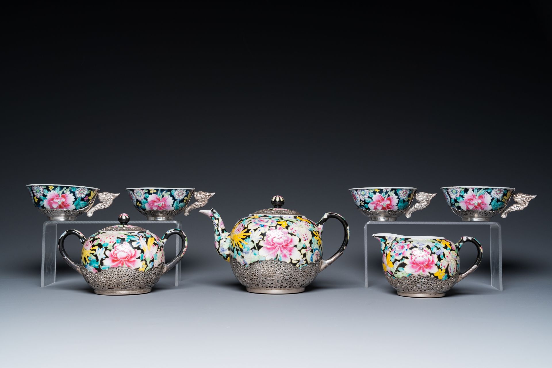 A Chinese eight-piece silver-mounted famille rose millefleurs tea service, Qianlong mark 20th C. - Image 5 of 12