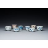 Eight Chinese mostly blue and white wine and tea cups, Ming