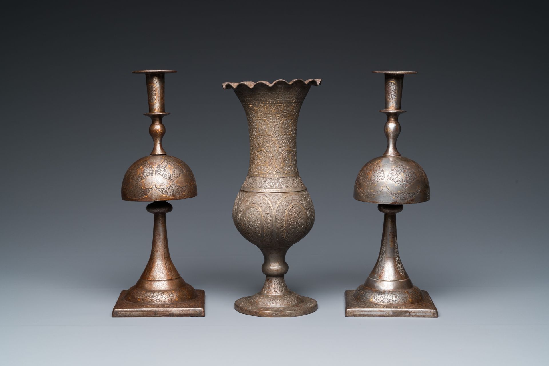 A pair of Qajar damascened candlesticks and a vase, Persia, 19th C. - Image 3 of 7