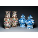 A pair of Chinese blue and white covered vases and a pair of Nanking famille rose vases, 19th C.