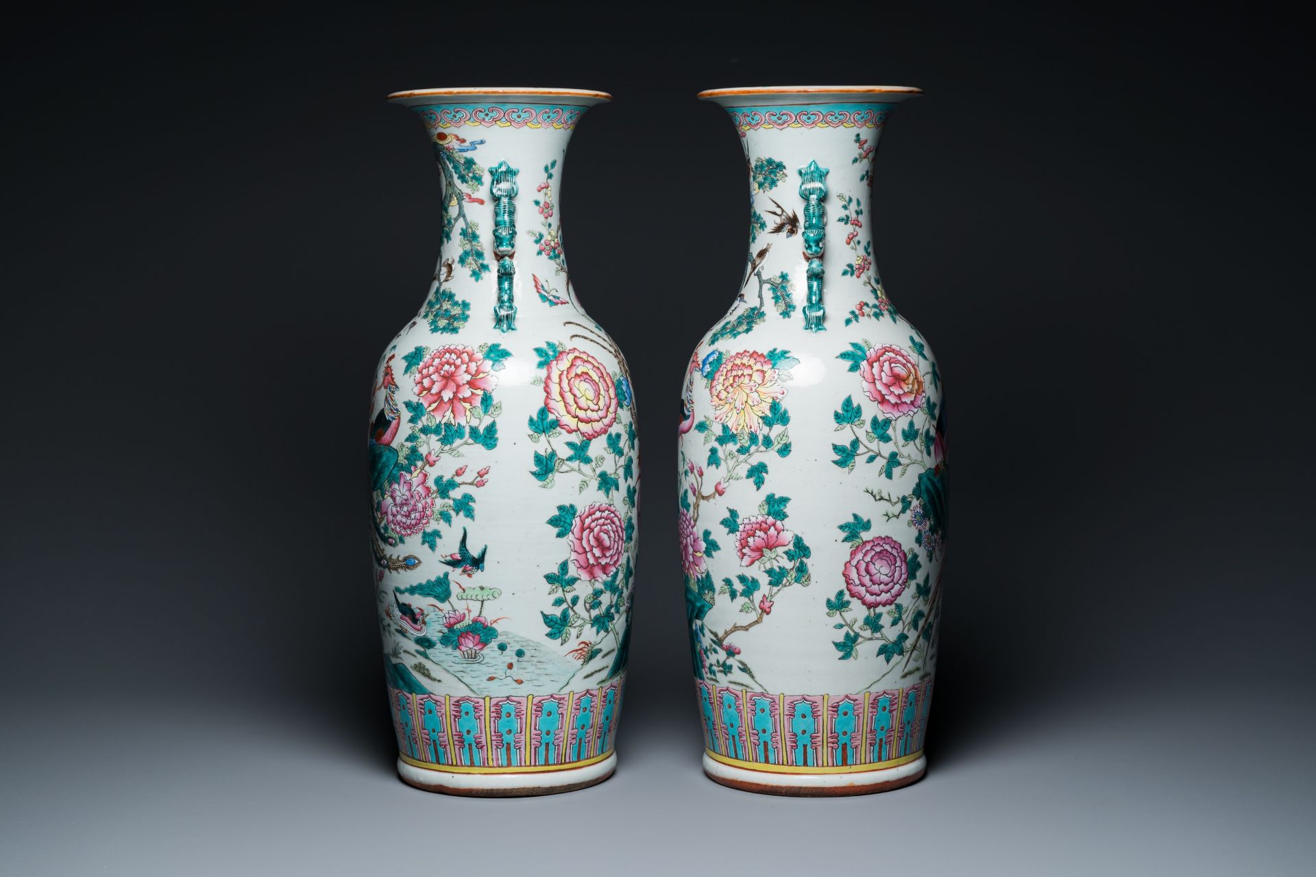 A pair of Chinese famille rose 'phoenixes and pheasants' vases, 19th C. - Image 4 of 6