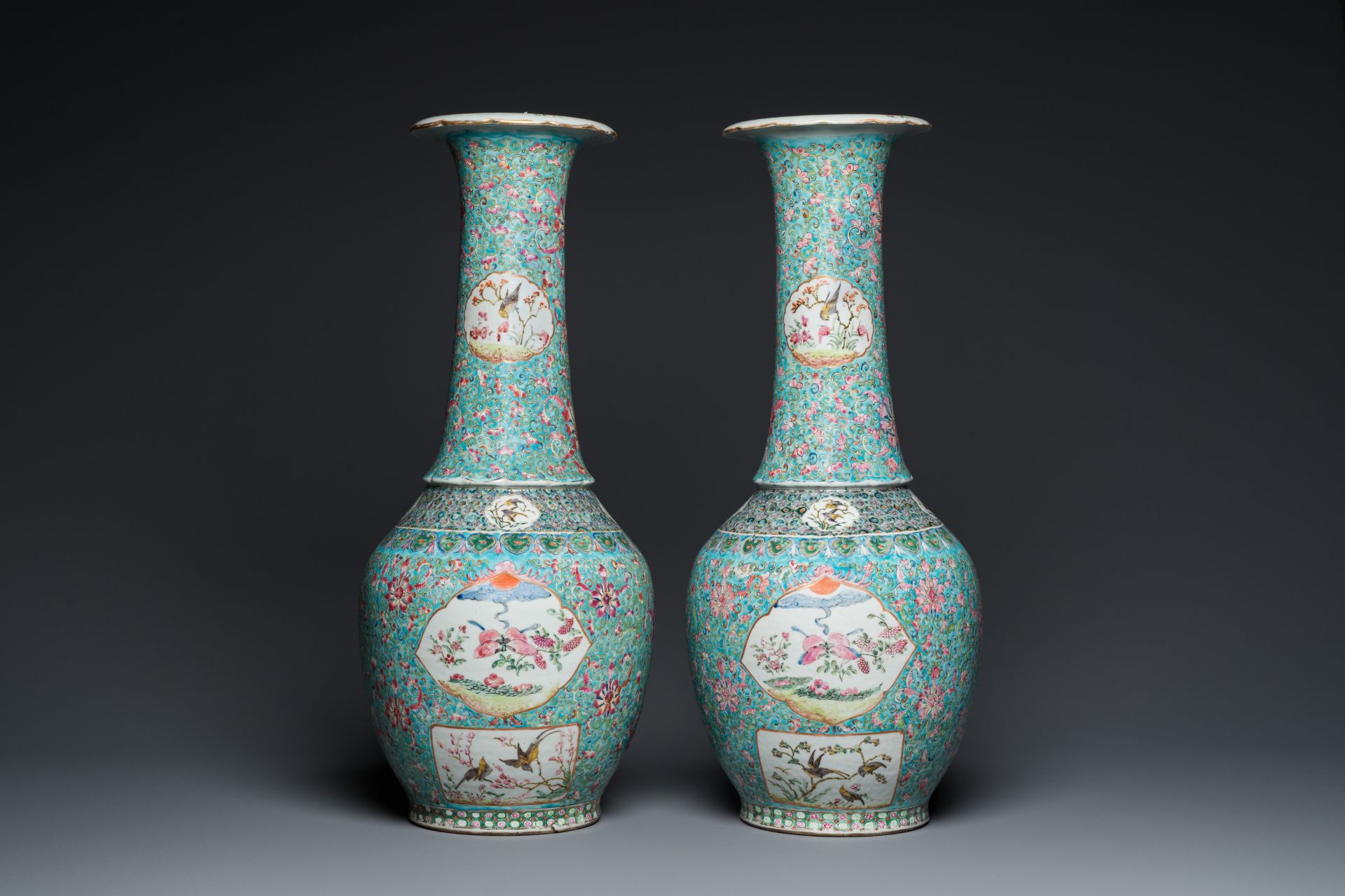 A pair of Chinese turquoise-ground famille rose vases, 19th C.