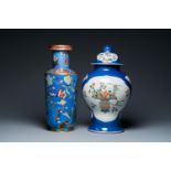 A Chinese famille verte powder-blue-ground vase and a cloisonne rouleau vase, 19th C.