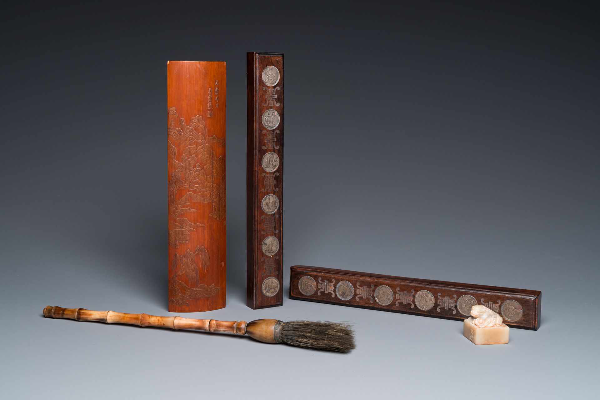 Five Chinese scholar's objects in bamboo, bone, inlaid wood and soapstone, 19/20th C.