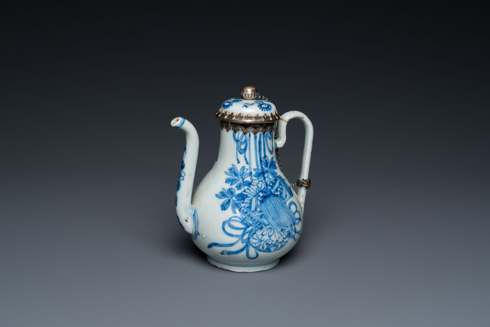 A Chinese blue and white teapot and cover with silver mounts, Kangxi