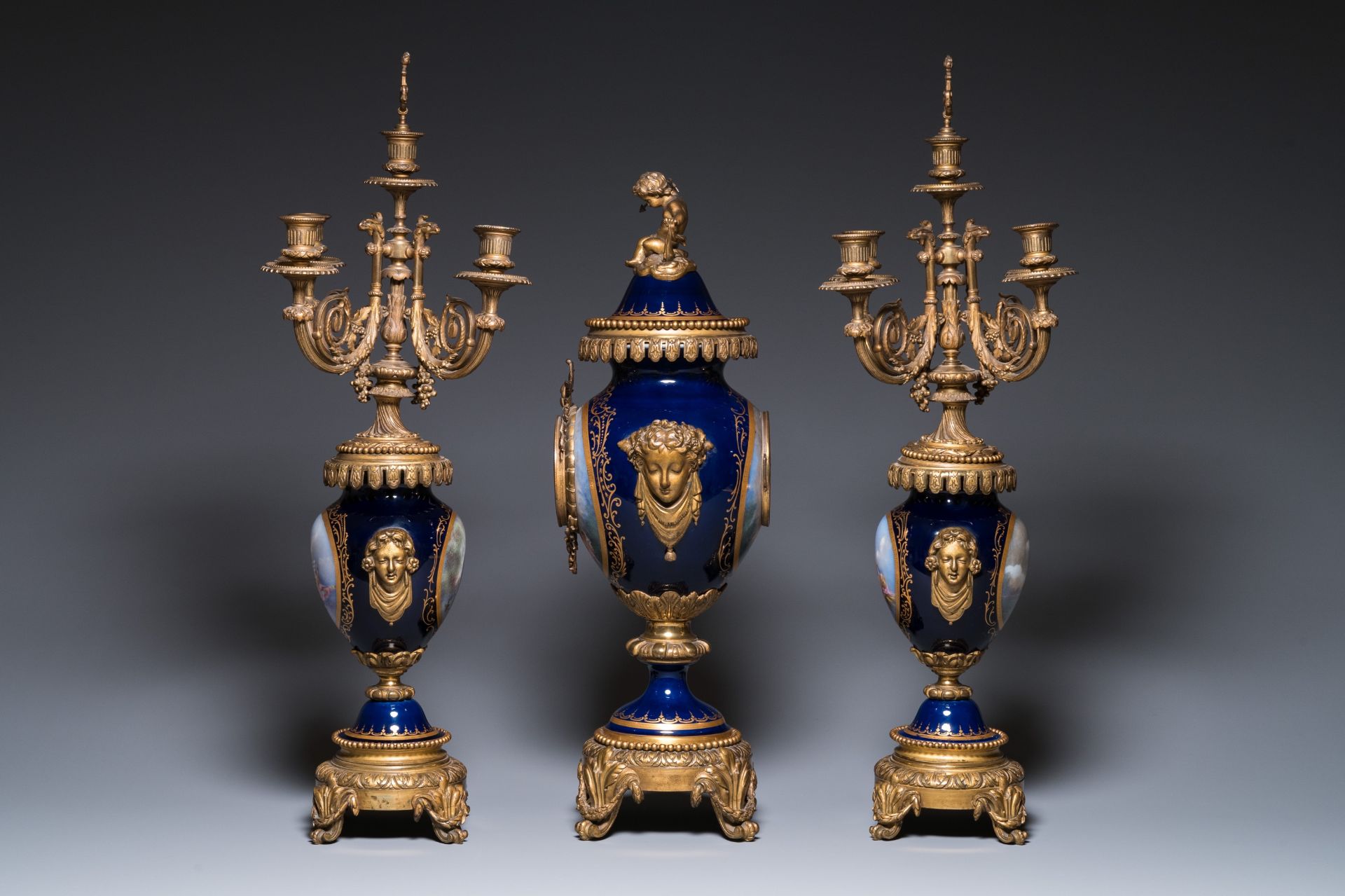 A large three-piece Sevres-style clock garniture with gilt bronze mounts, France, 19th C. - Image 4 of 11