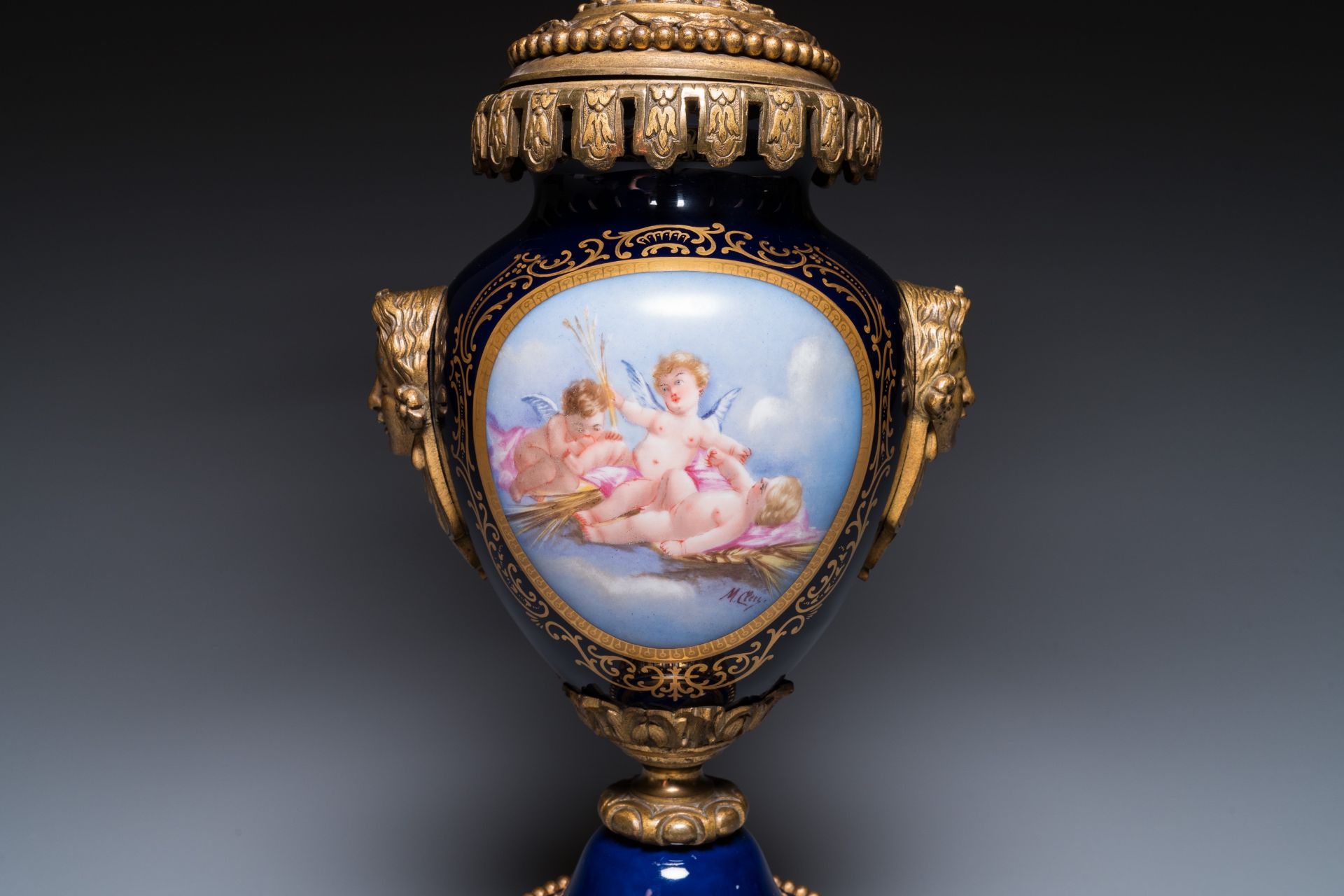 A large three-piece Sevres-style clock garniture with gilt bronze mounts, France, 19th C. - Image 10 of 11