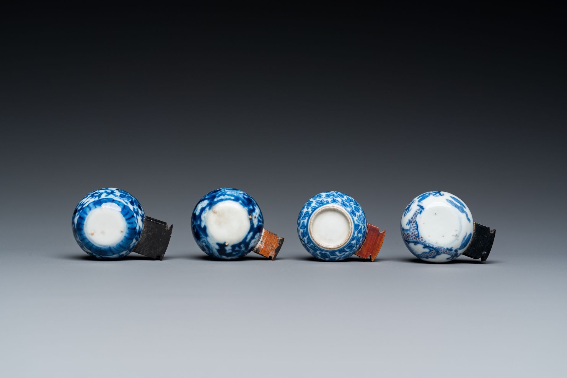 Four Chinese blue, white and copper-red bird feeders, 19th C. - Image 7 of 7