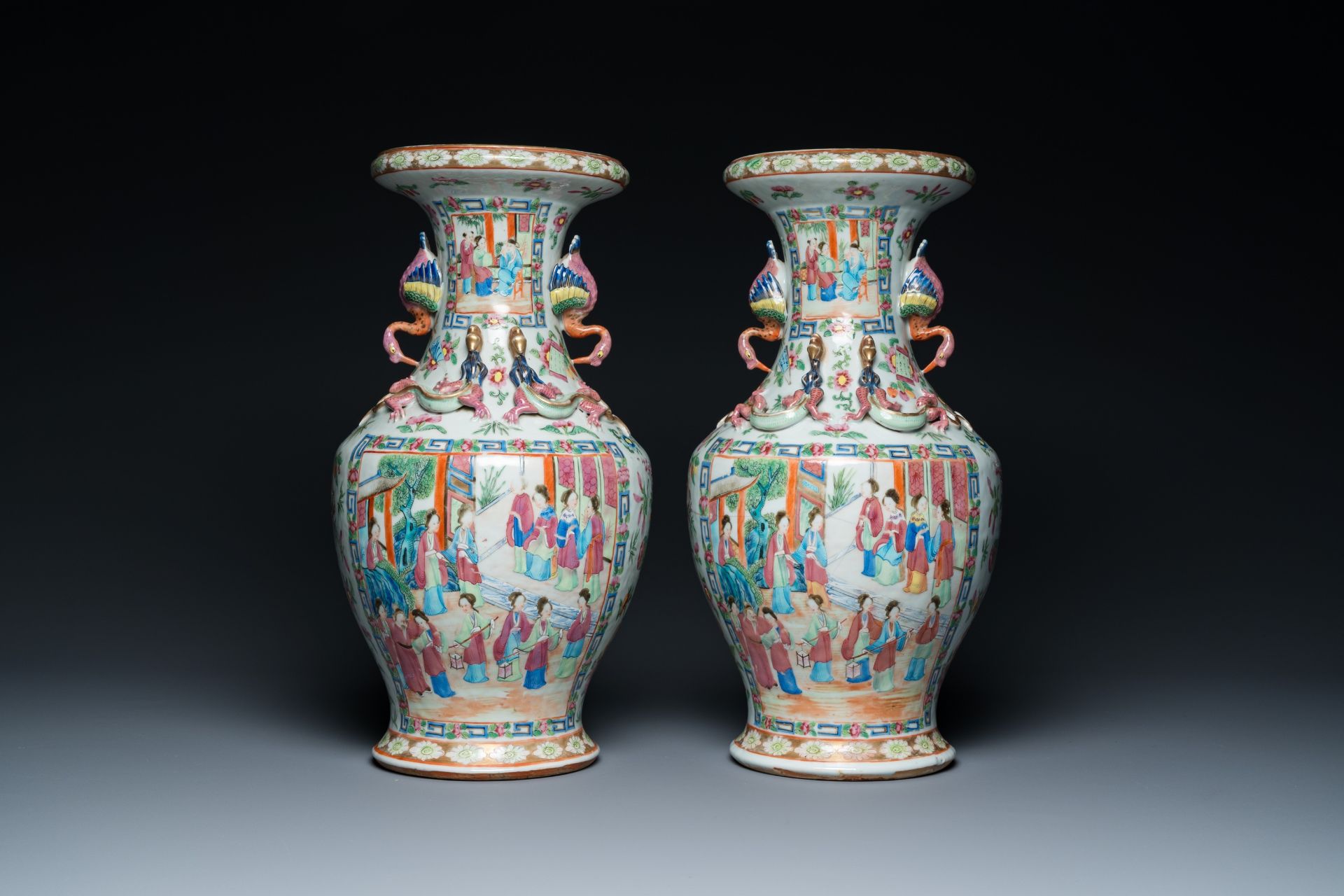 A pair of Chinese Canton famille rose vases with duck-shaped handles, 19th C. - Image 4 of 7