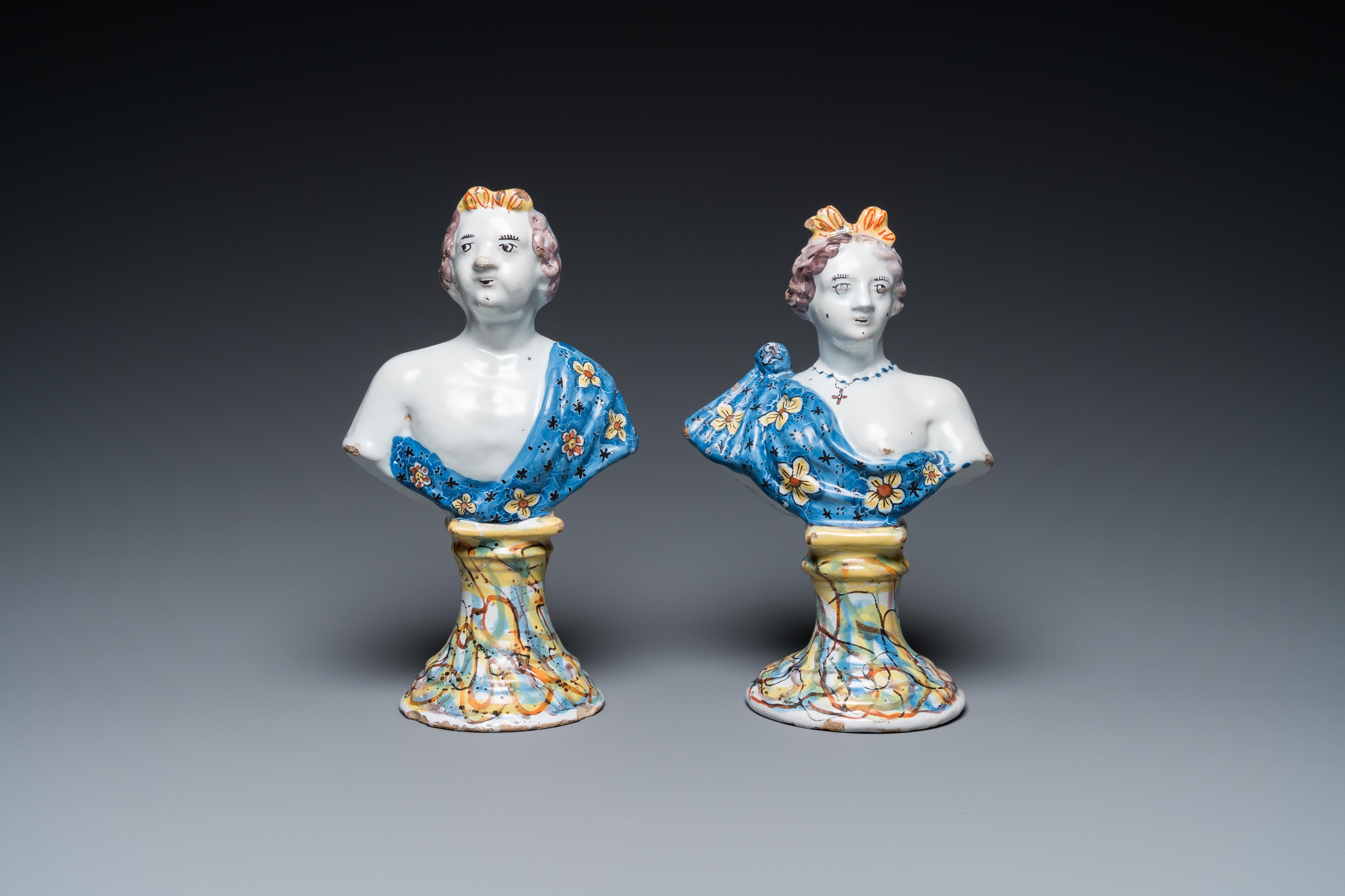 A pair of polychrome Dutch Delft busts on bases imitating marble, 18th C. - Image 2 of 7