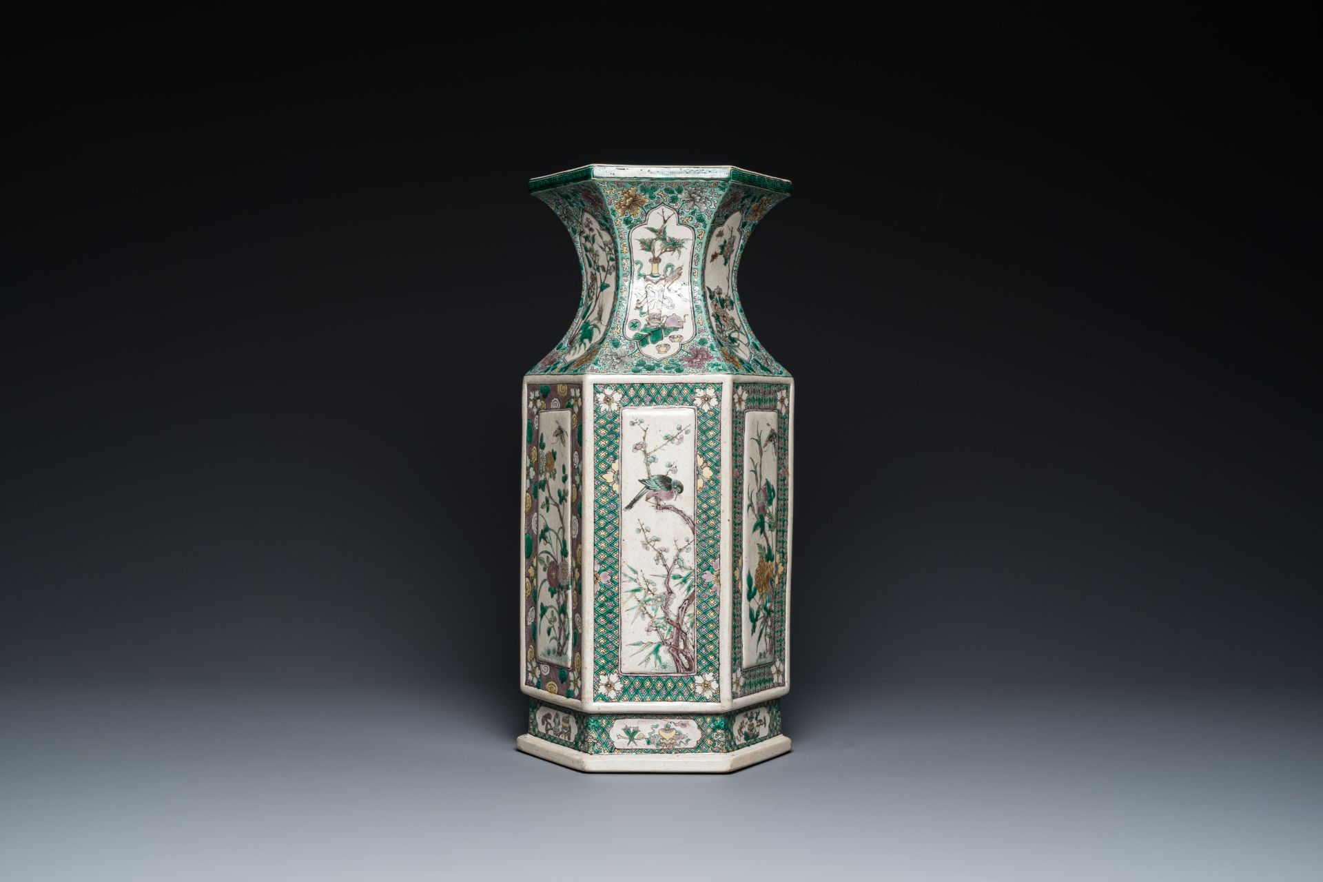 A Chinese hexagonal verte biscuit vase, 19th C.