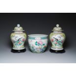 A pair of Chinese famille rose covered vases and a jardiniere, 19/20th C.