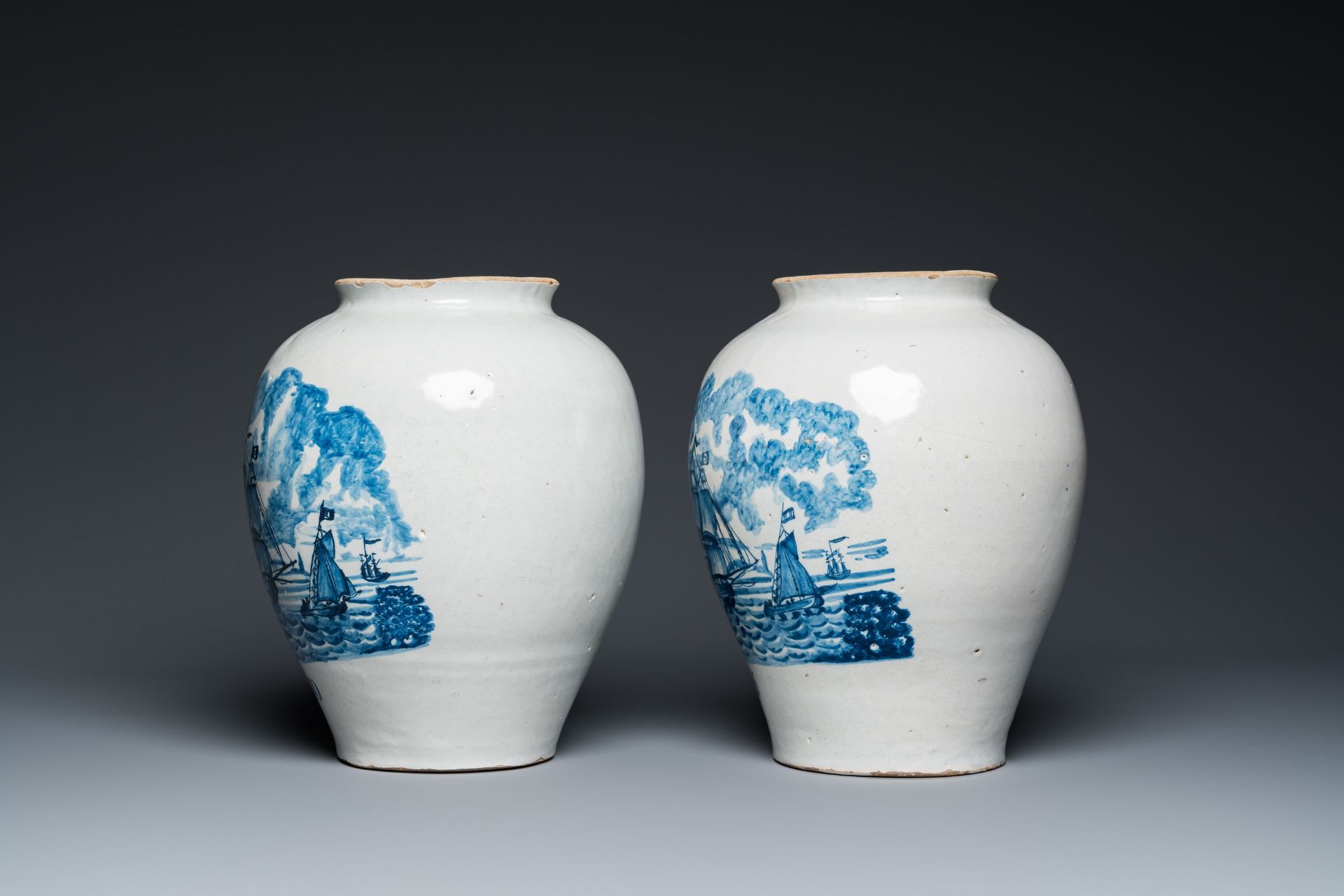 A pair of rare Dutch Delft blue and white 'maritime subject' tobacco jars with brass covers, 18th C. - Image 3 of 7