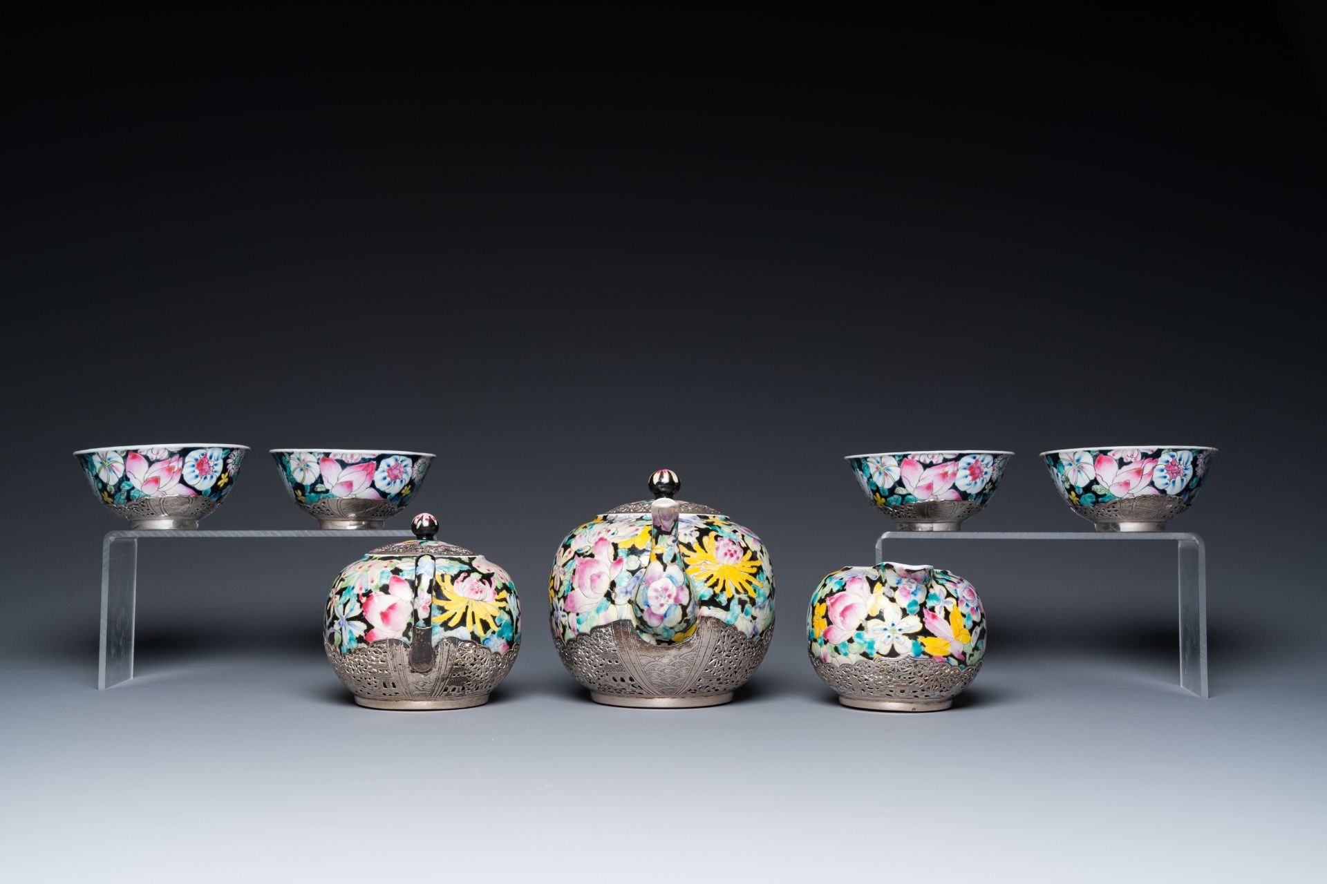 A Chinese eight-piece silver-mounted famille rose millefleurs tea service, Qianlong mark 20th C. - Image 7 of 12