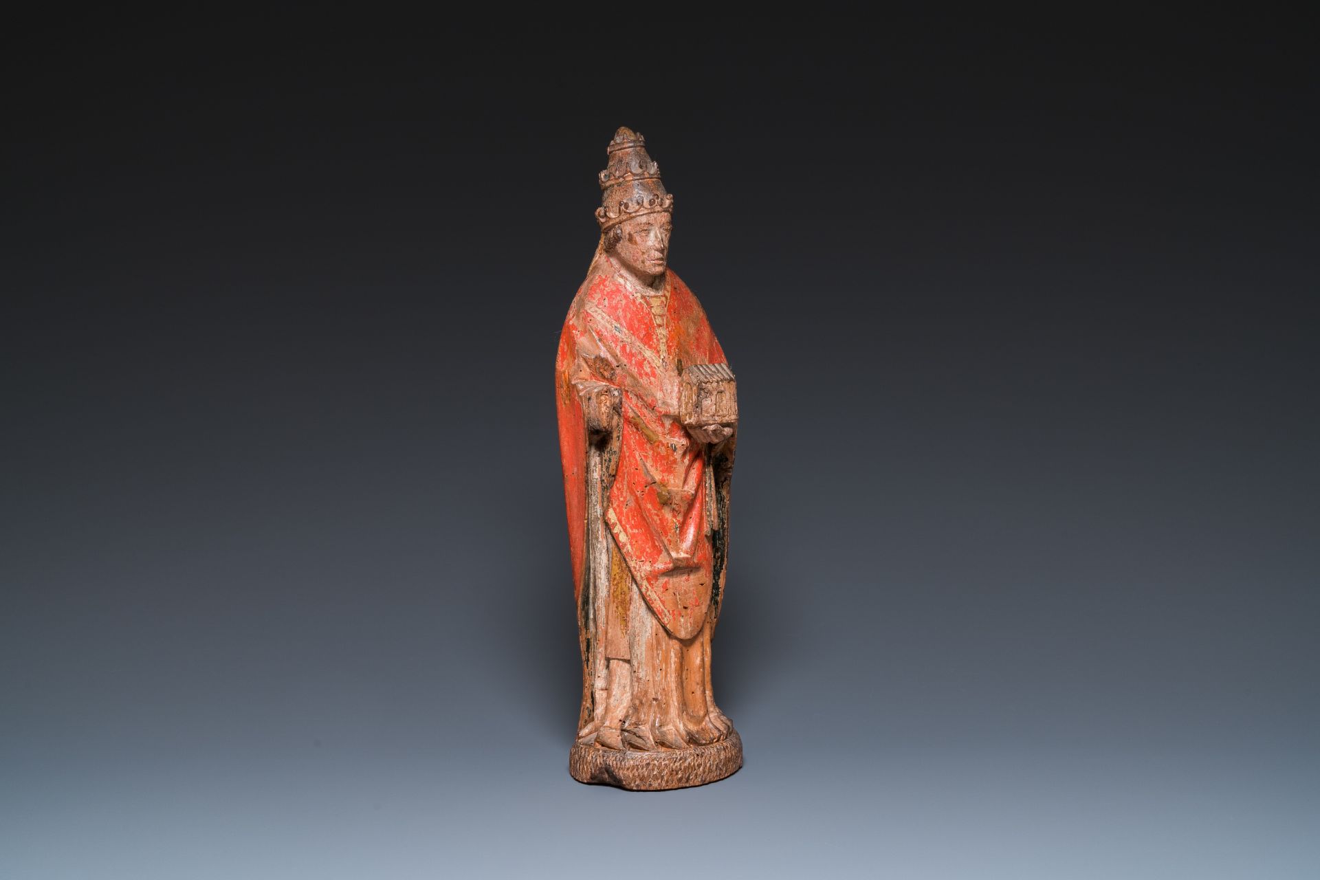 A polychromed walnut sculpture of Pope Nicholas V, Northern France, 15th C.