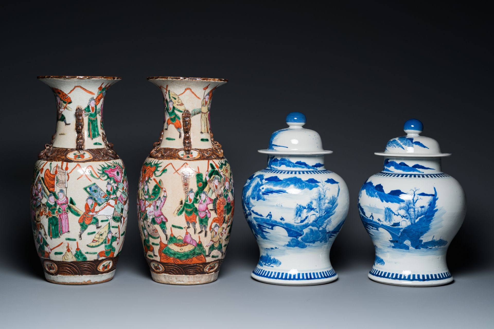 A pair of Chinese blue and white covered vases and a pair of Nanking famille rose vases, 19th C. - Image 3 of 9