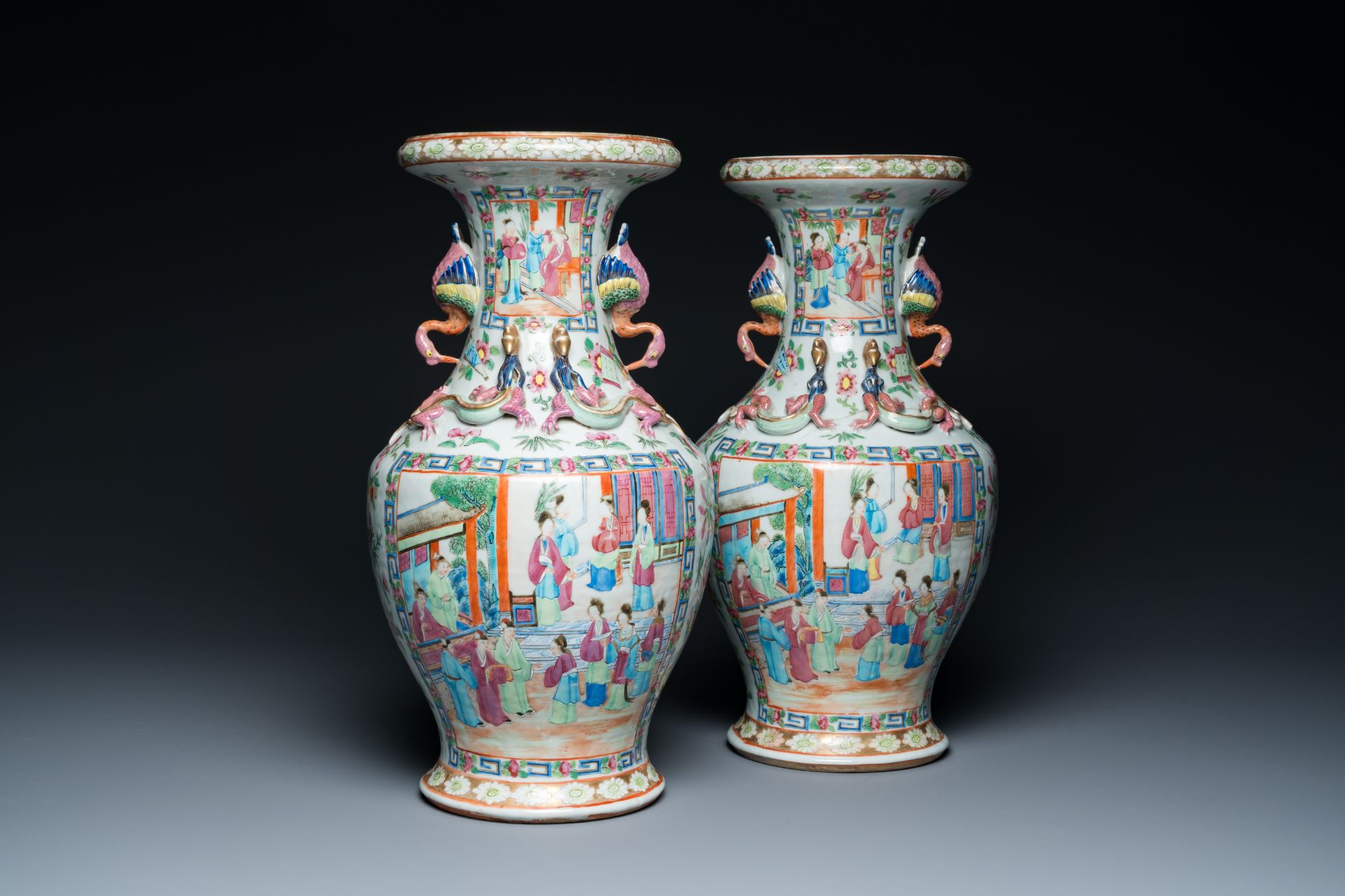 A pair of Chinese Canton famille rose vases with duck-shaped handles, 19th C.