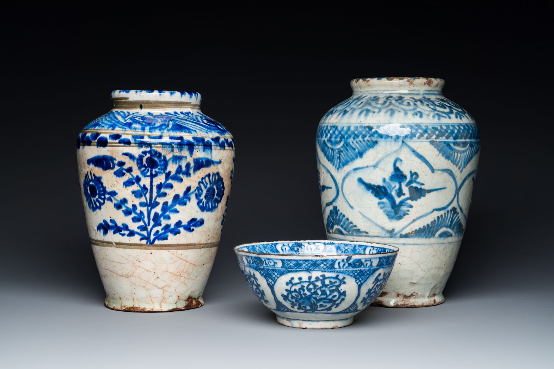 Two blue and white Islamic pottery storage jars and a bowl, Persia, 17/19th C.