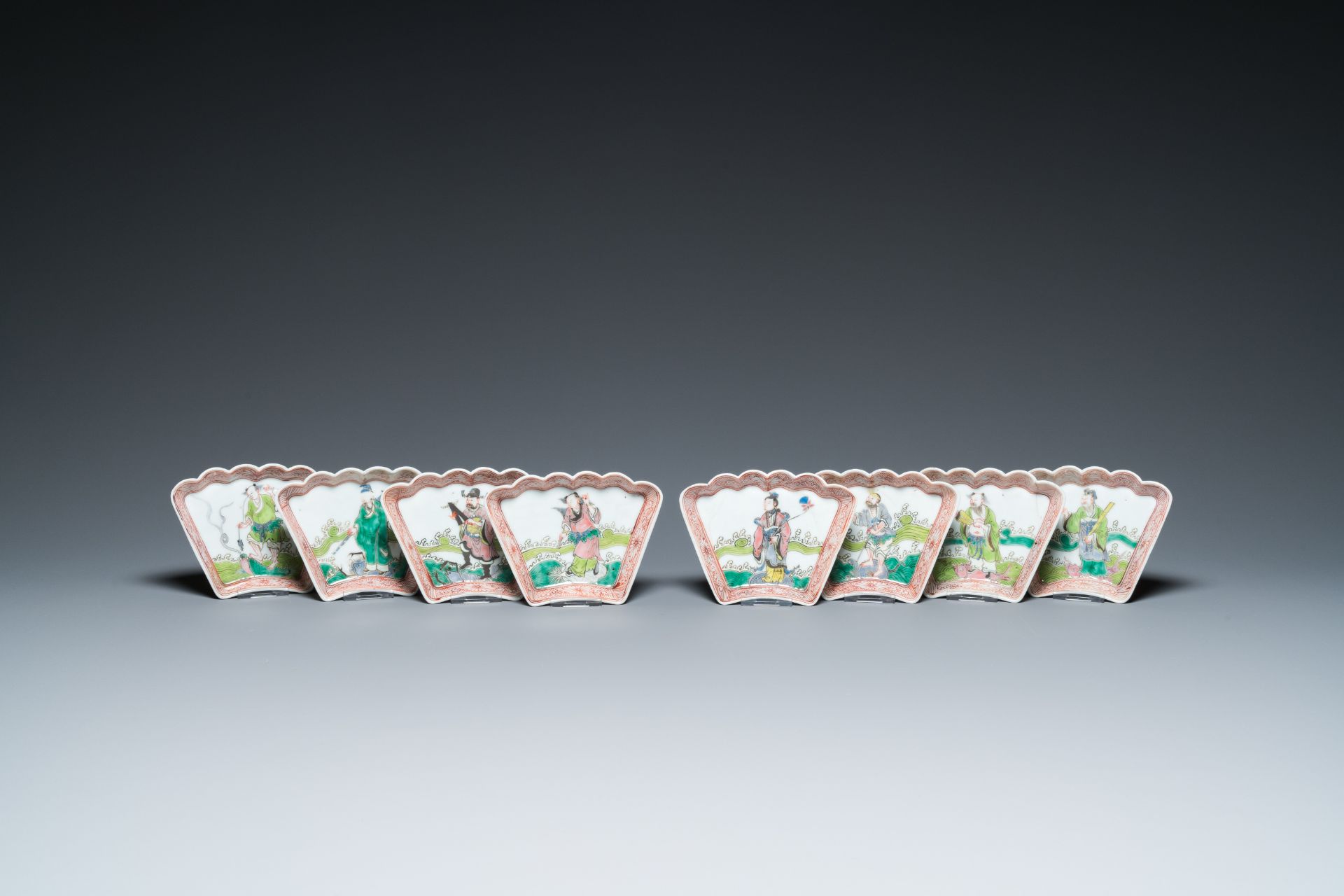 A Chinese famille rose eight-piece 'immortals' sweetmeat set, 19th C.