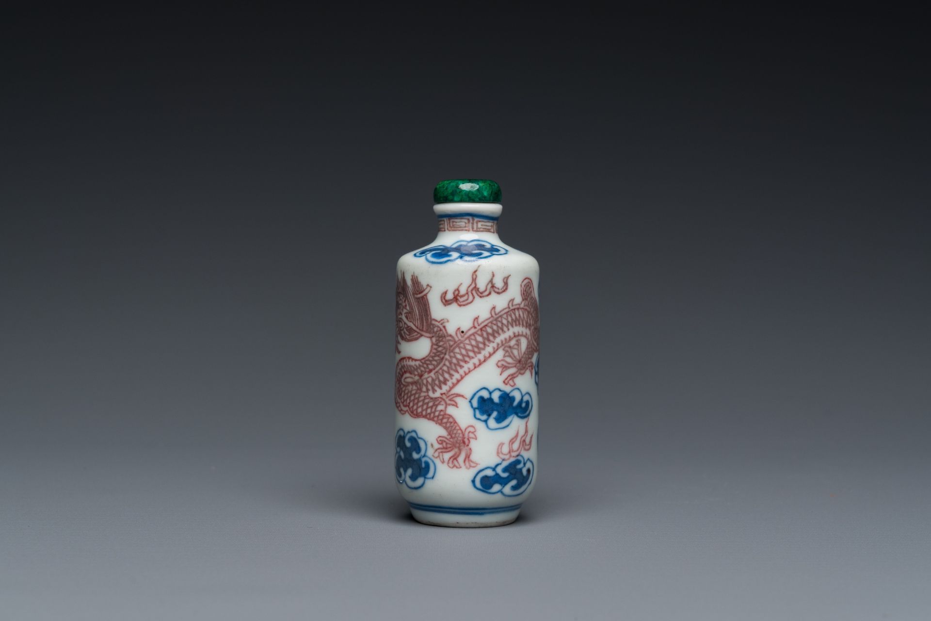 A Chinese blue, white and copper-red 'dragon' snuff bottle, Yongzheng mark, 19th C. - Image 2 of 6