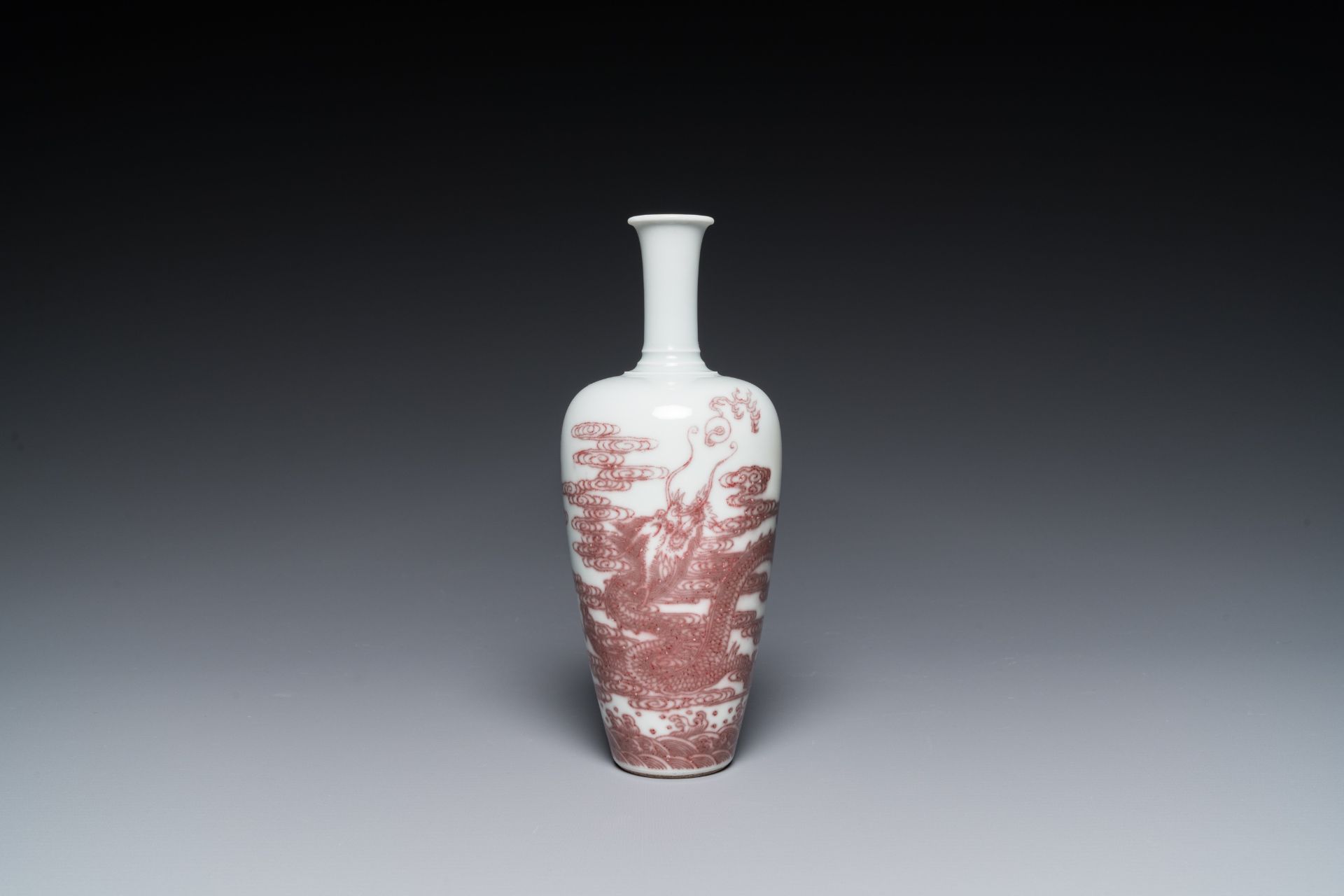 A Chinese copper-red 'dragon' vase on wooden stand, Kangxi mark, 19/20th C. - Image 2 of 7