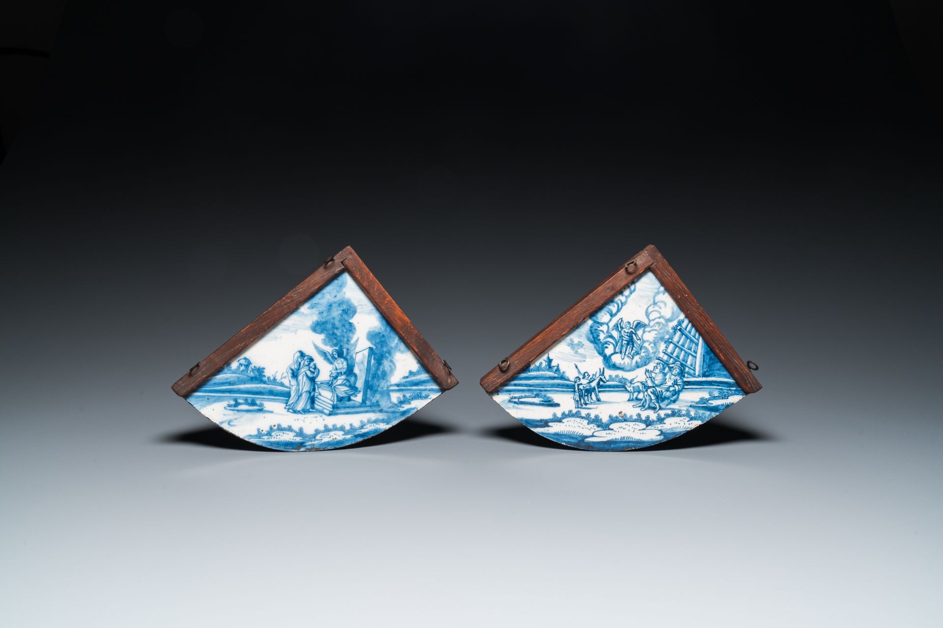 A pair of rare Dutch Delfware blue and white corner or quadrant tiles with biblical scenes, Amsterda