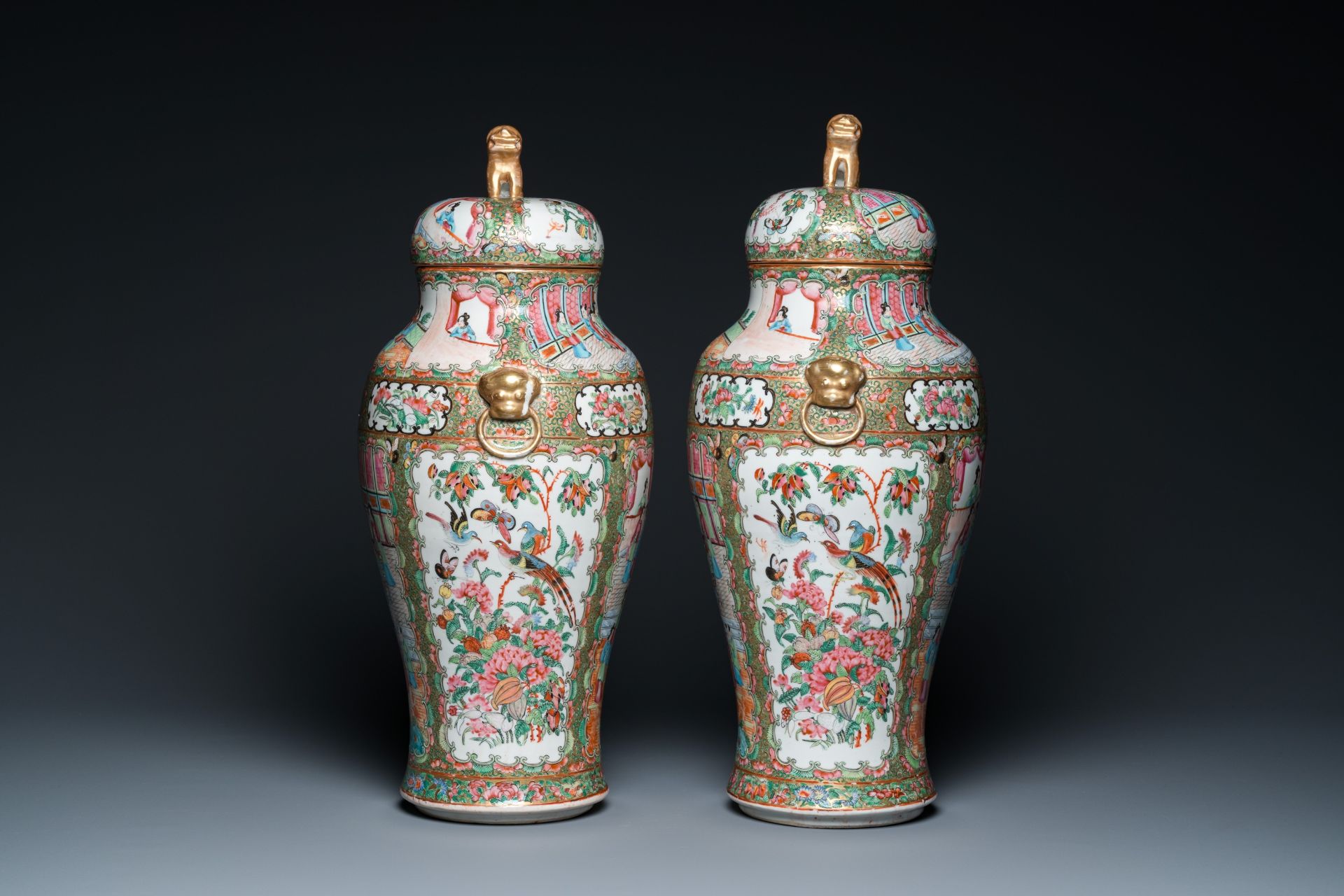 A pair of Chinese Canton famille rose vases and covers, 19th C. - Image 2 of 6