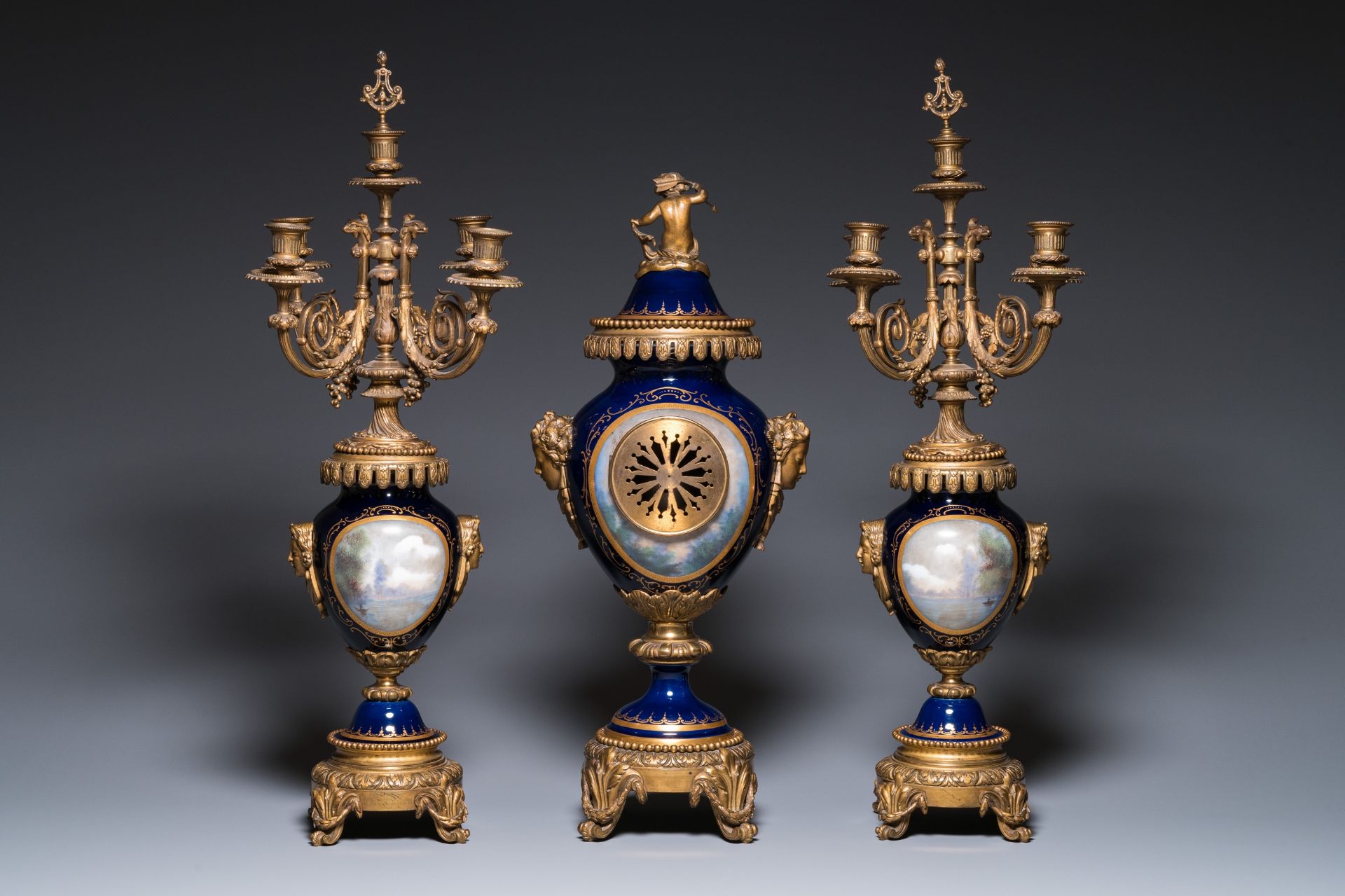 A large three-piece Sevres-style clock garniture with gilt bronze mounts, France, 19th C. - Image 3 of 11