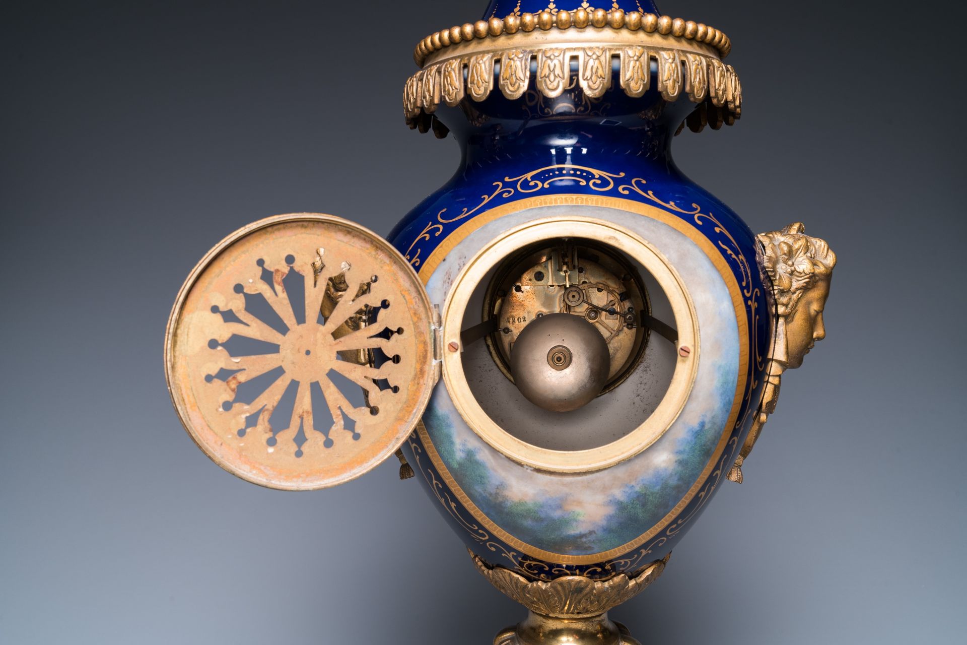 A large three-piece Sevres-style clock garniture with gilt bronze mounts, France, 19th C. - Image 8 of 11