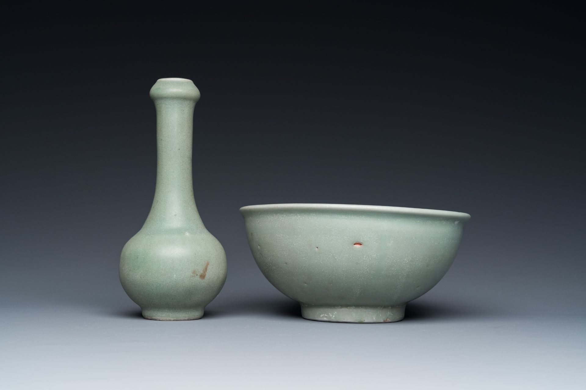 A Chinese celadon-glazed bottle vase and two bowls, Yuan/Ming - Image 6 of 9
