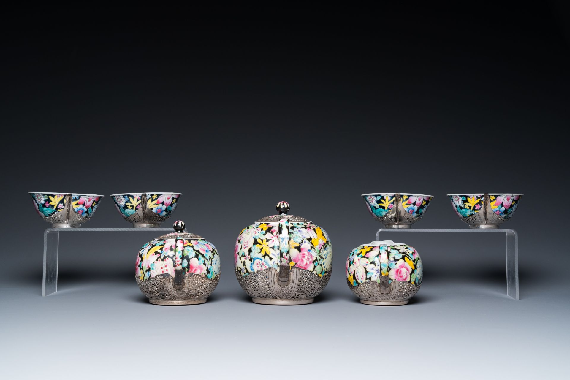 A Chinese eight-piece silver-mounted famille rose millefleurs tea service, Qianlong mark 20th C. - Image 8 of 12