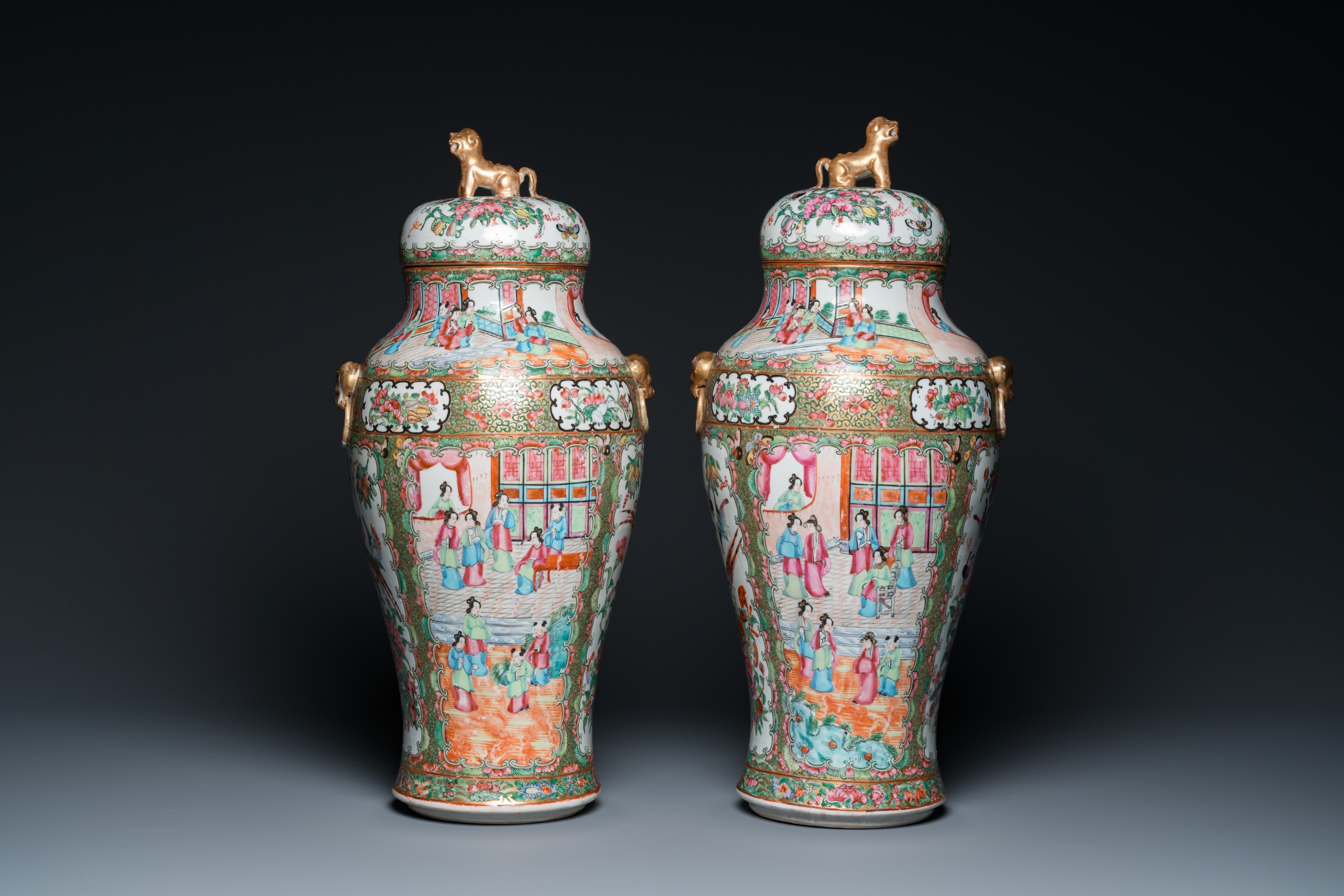 A pair of Chinese Canton famille rose vases and covers, 19th C. - Image 3 of 6