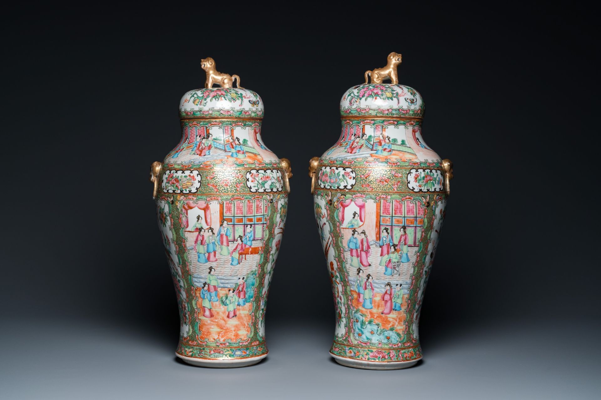 A pair of Chinese Canton famille rose vases and covers, 19th C. - Image 3 of 6