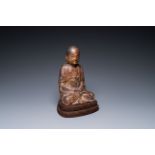 A Chinese gilt-lacquered wood sculpture of Buddha, Ming