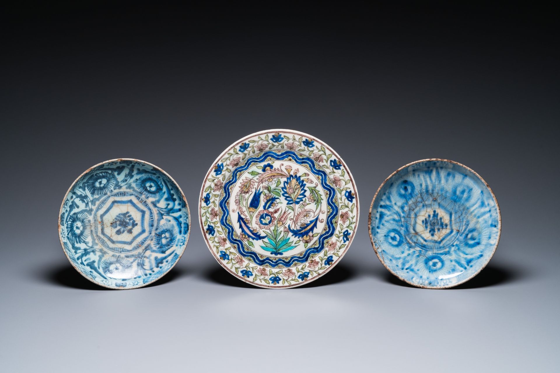 Five blue and white and polychrome Islamic pottery dishes, Qajar, Persia, 19th C. - Image 2 of 5