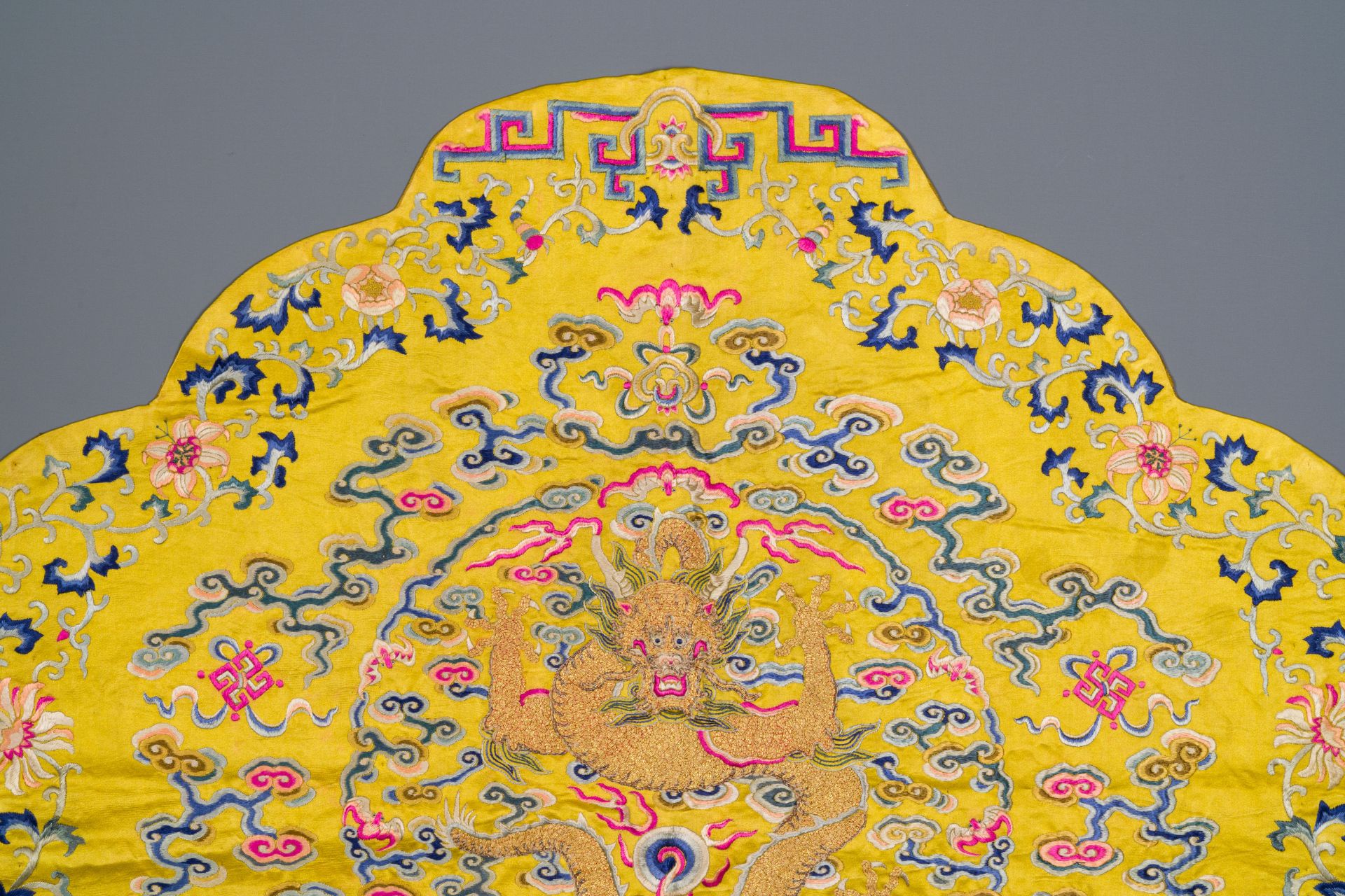 An imperial Chinese embroidered silk gold-thread yellow-ground cushion cover, 19th C. - Image 3 of 5