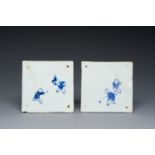 Two very rare Chinese blue and white 'playing boys' tiles, Kangxi