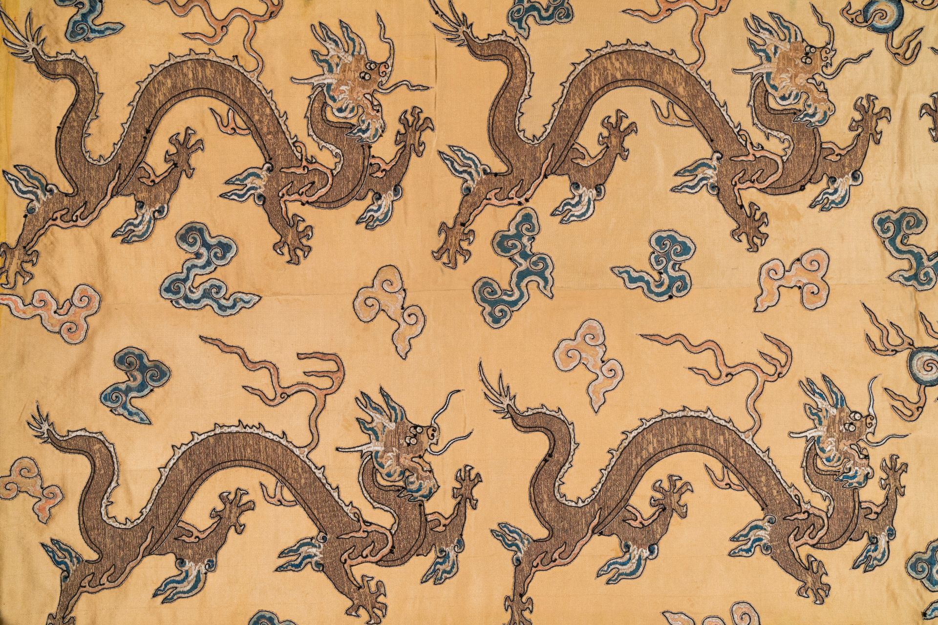 A Chinese yellow-ground silk embroidery decorated with sixteen five-clawed dragons, Da Ming 大明 mark - Image 4 of 5